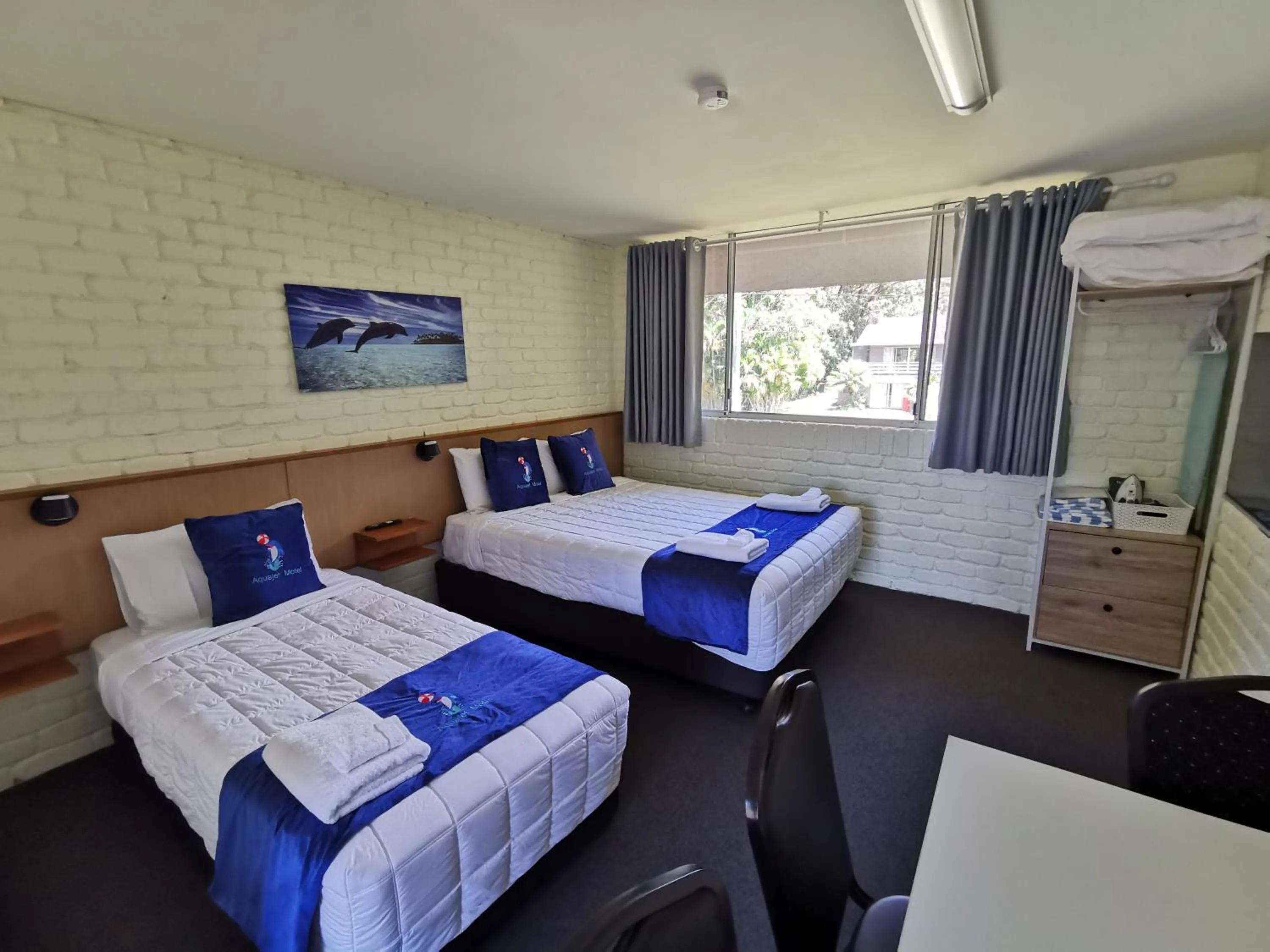 Bed in Aquajet Motel