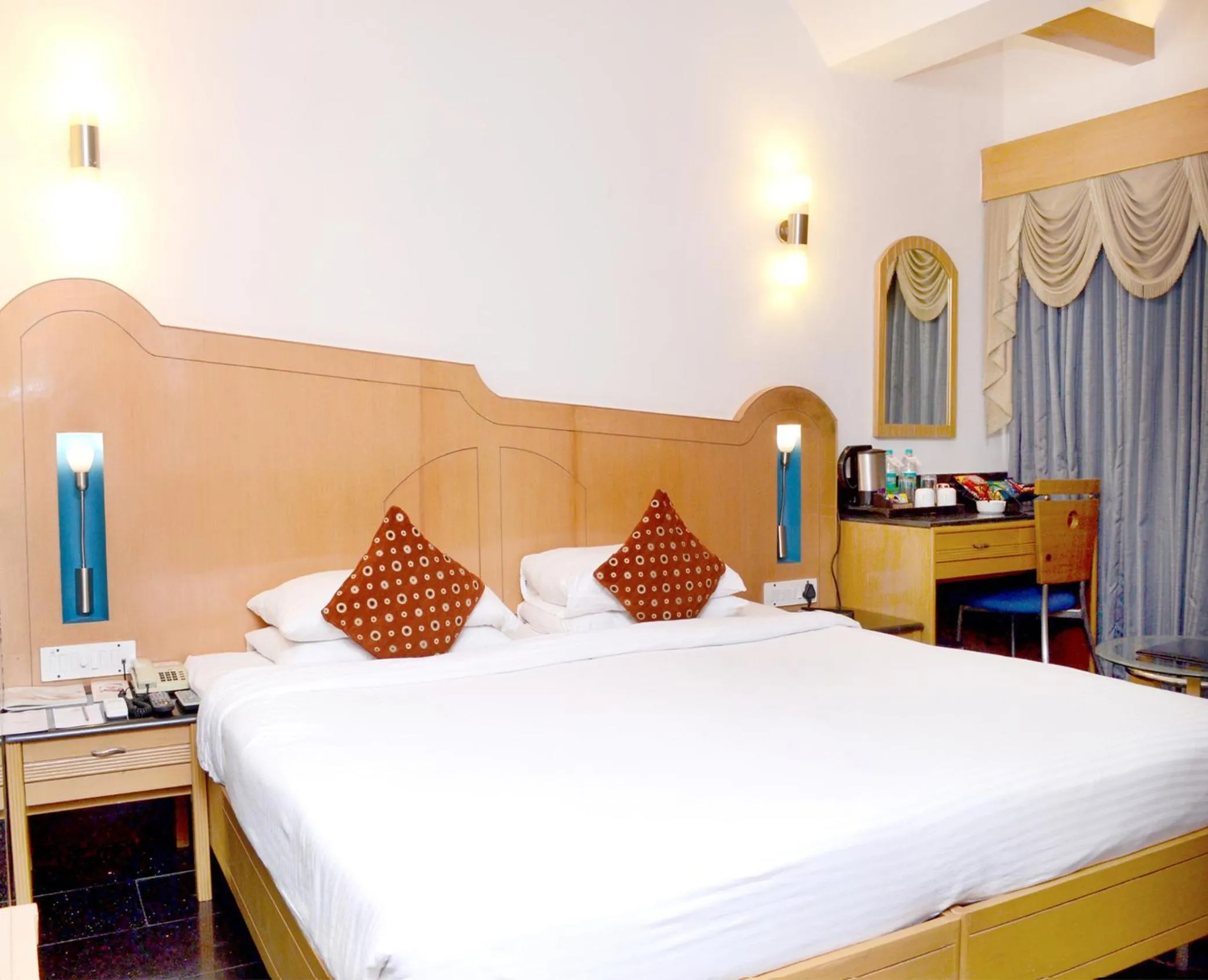 Bed in Ramee Guestline Hotel Khar