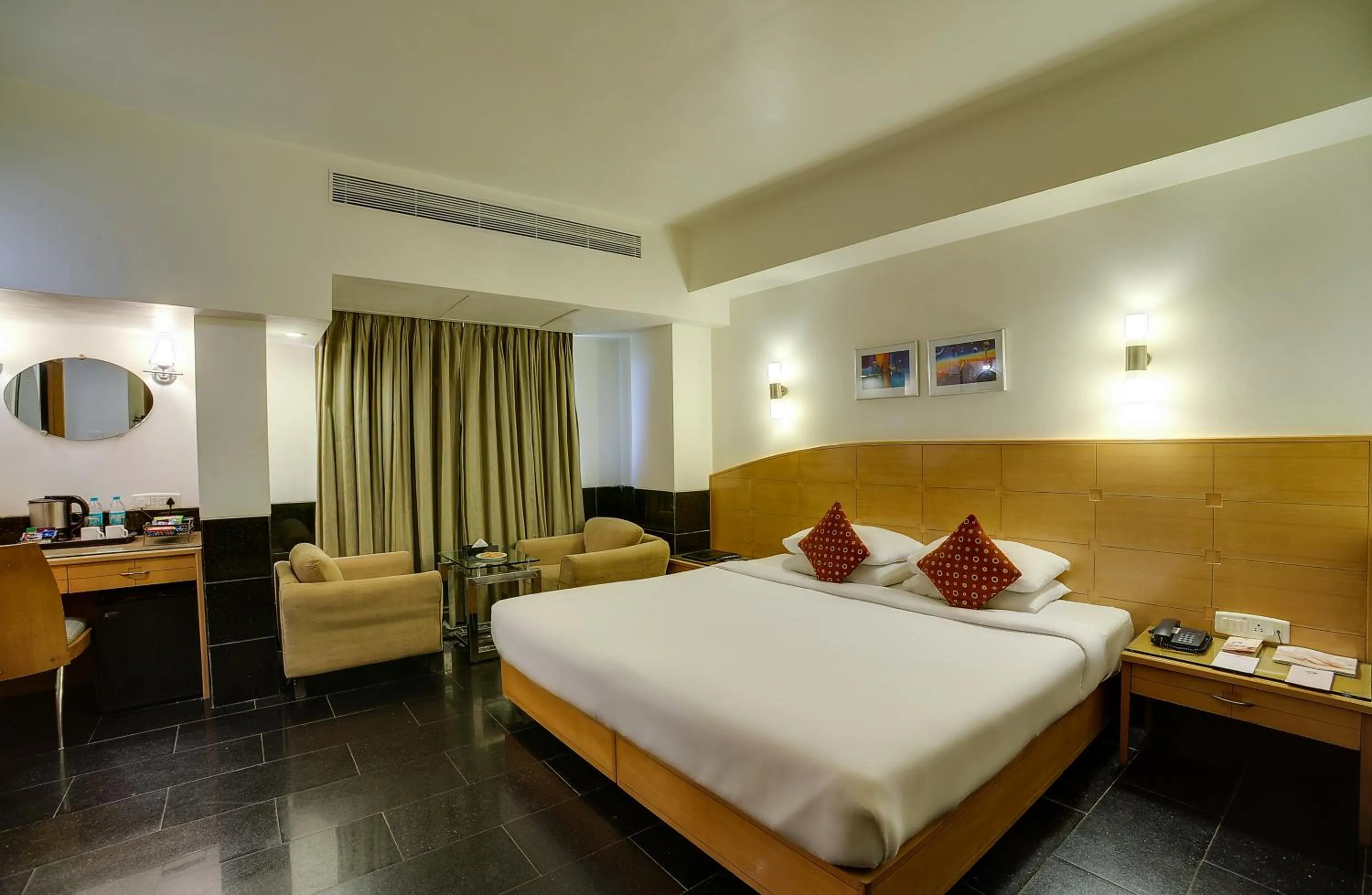 Photo of the whole room, Bed in Ramee Guestline Hotel Khar