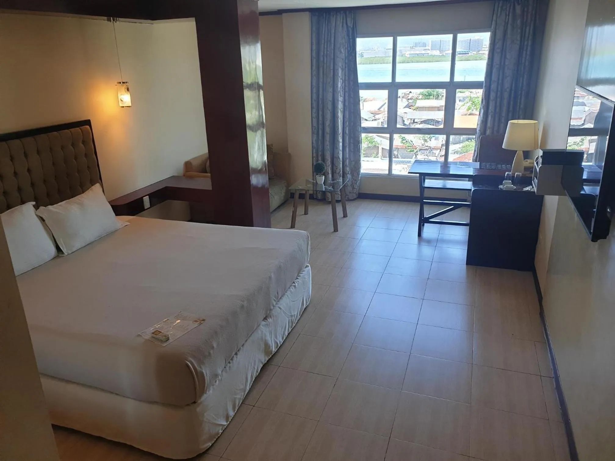 Bed in Cebu Dulcinea Hotel and Suites-MACTAN AIRPORT HOTEL