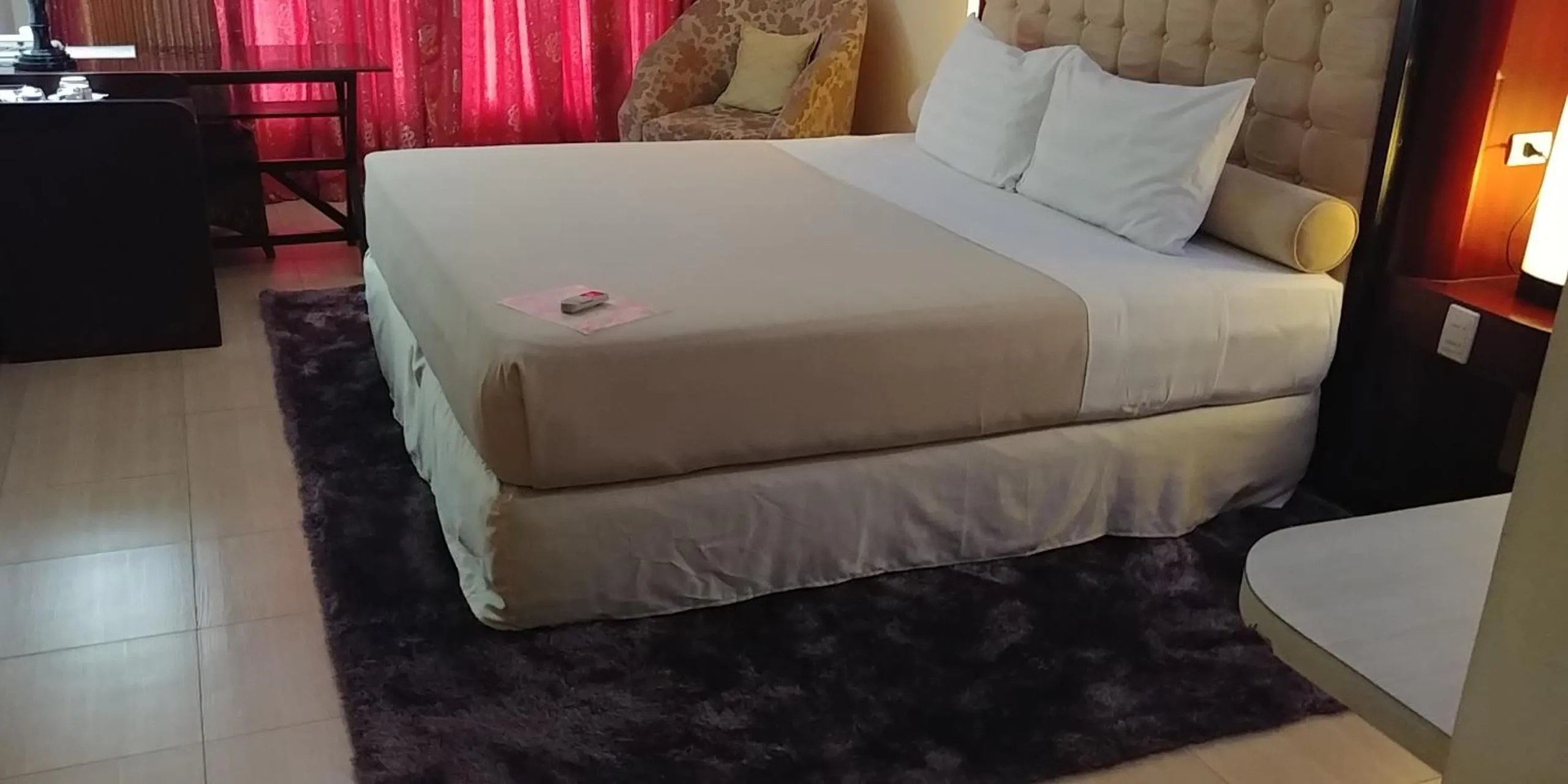 Bed in Cebu Dulcinea Hotel and Suites-MACTAN AIRPORT HOTEL