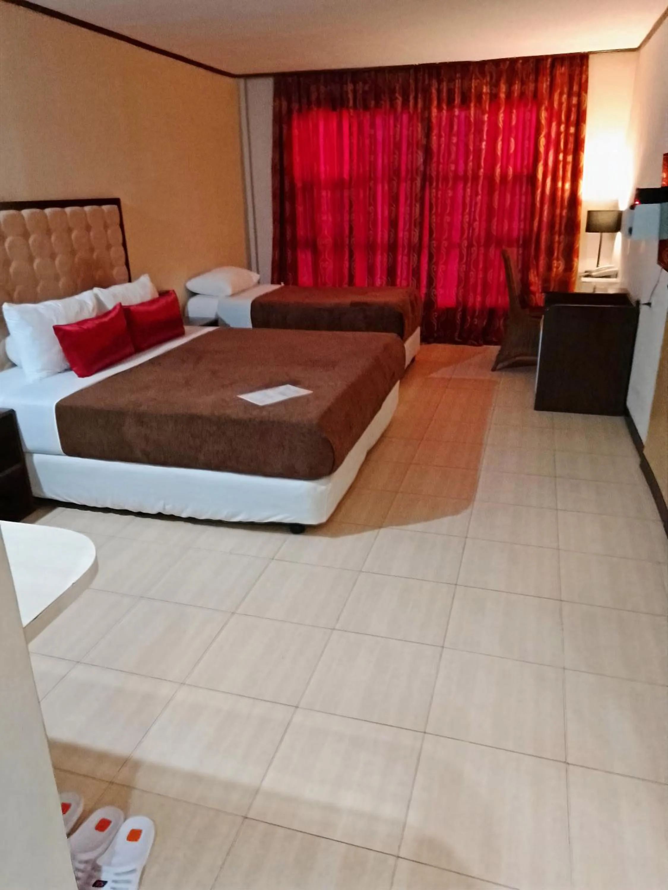 Bed in Cebu Dulcinea Hotel and Suites-MACTAN AIRPORT HOTEL