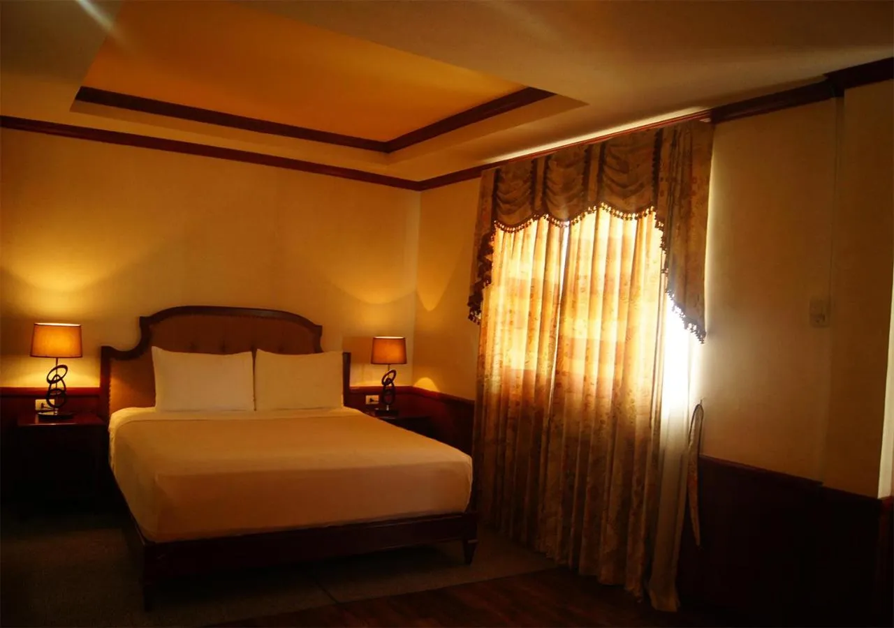 Bed in Cebu Dulcinea Hotel and Suites-MACTAN AIRPORT HOTEL