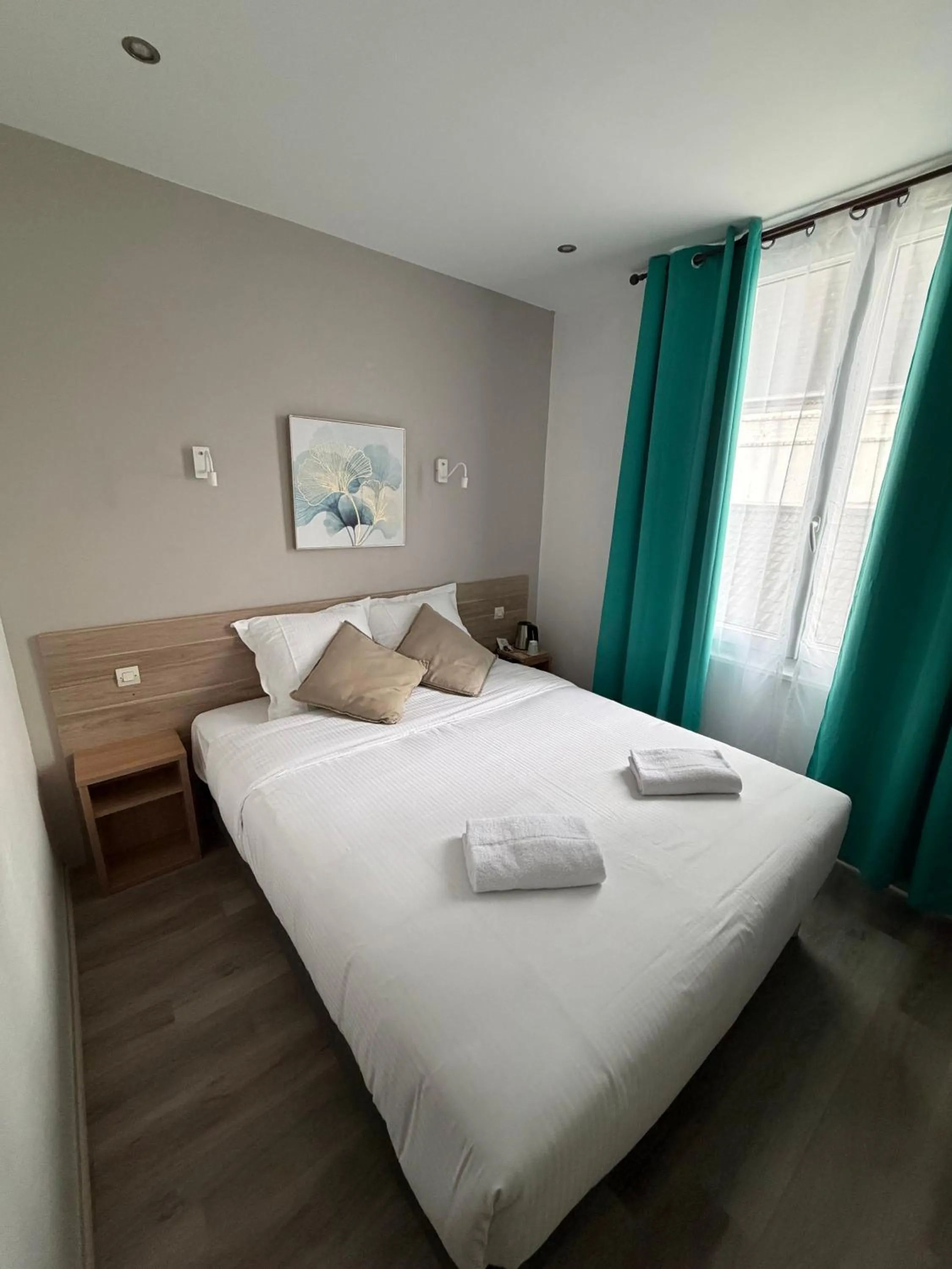 Bed in Hôtel Du Commerce