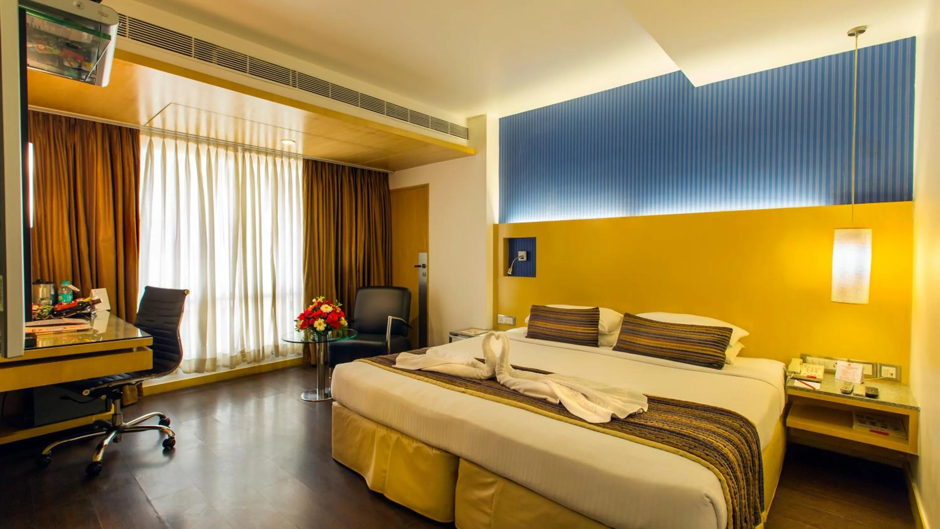 Photo of the whole room, Bed in Ramee Guestline Hotel Dadar