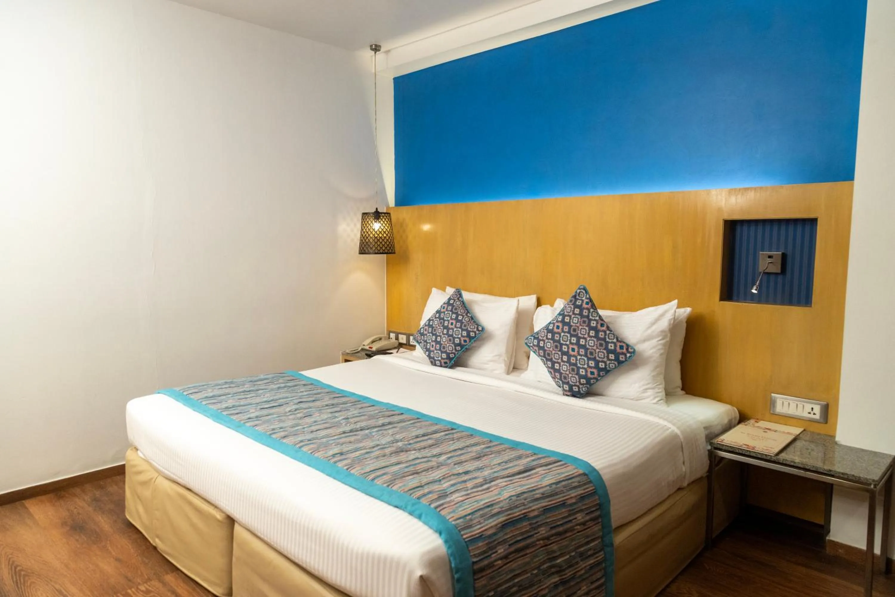 Bed in Ramee Guestline Hotel Dadar