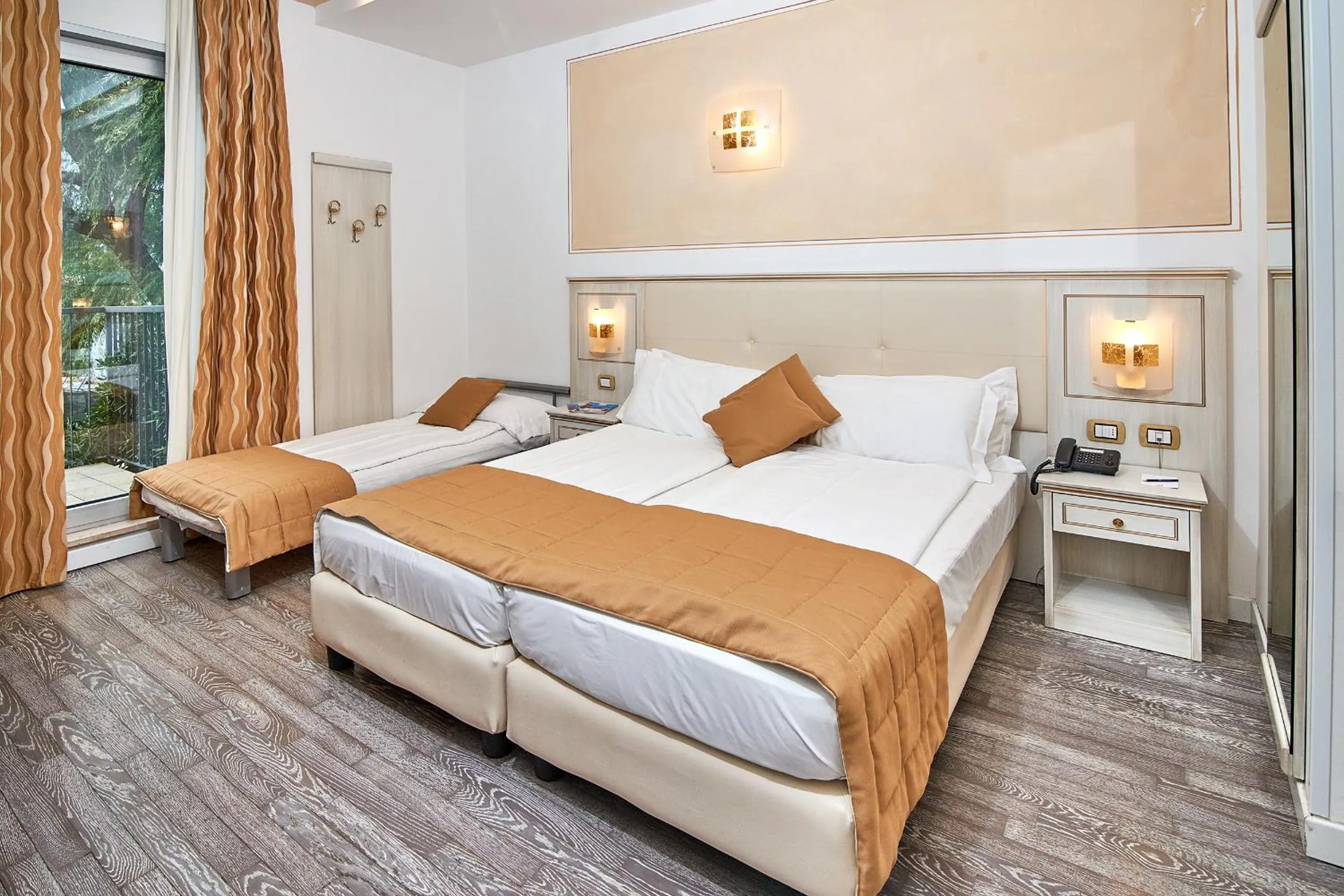 Garden view, Bed in Hotel Lido Blu - Surf & Bike