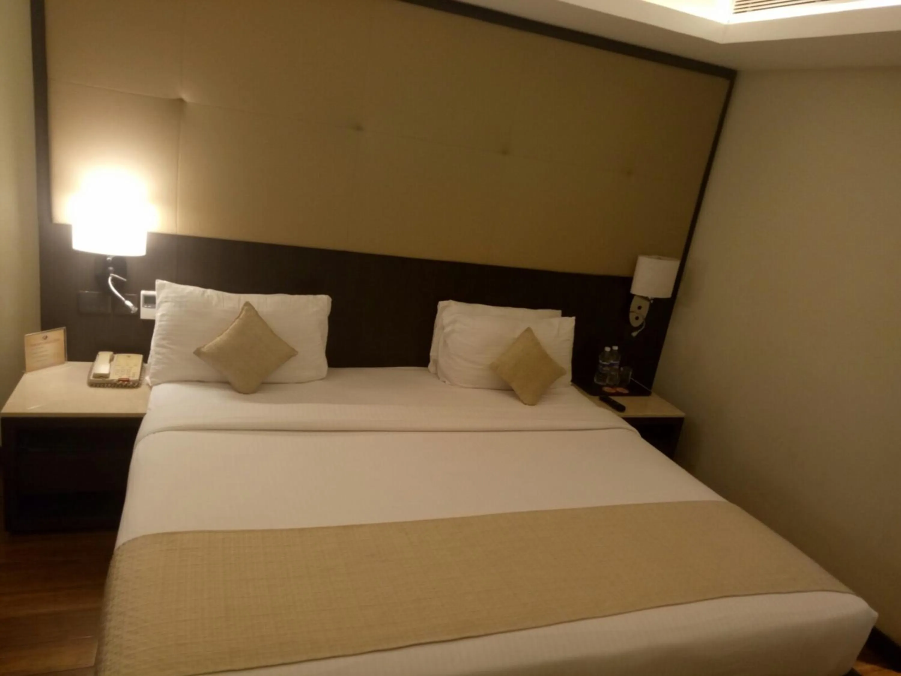 Bedroom, Bed in Ramee Guestline Hotel Bangalore