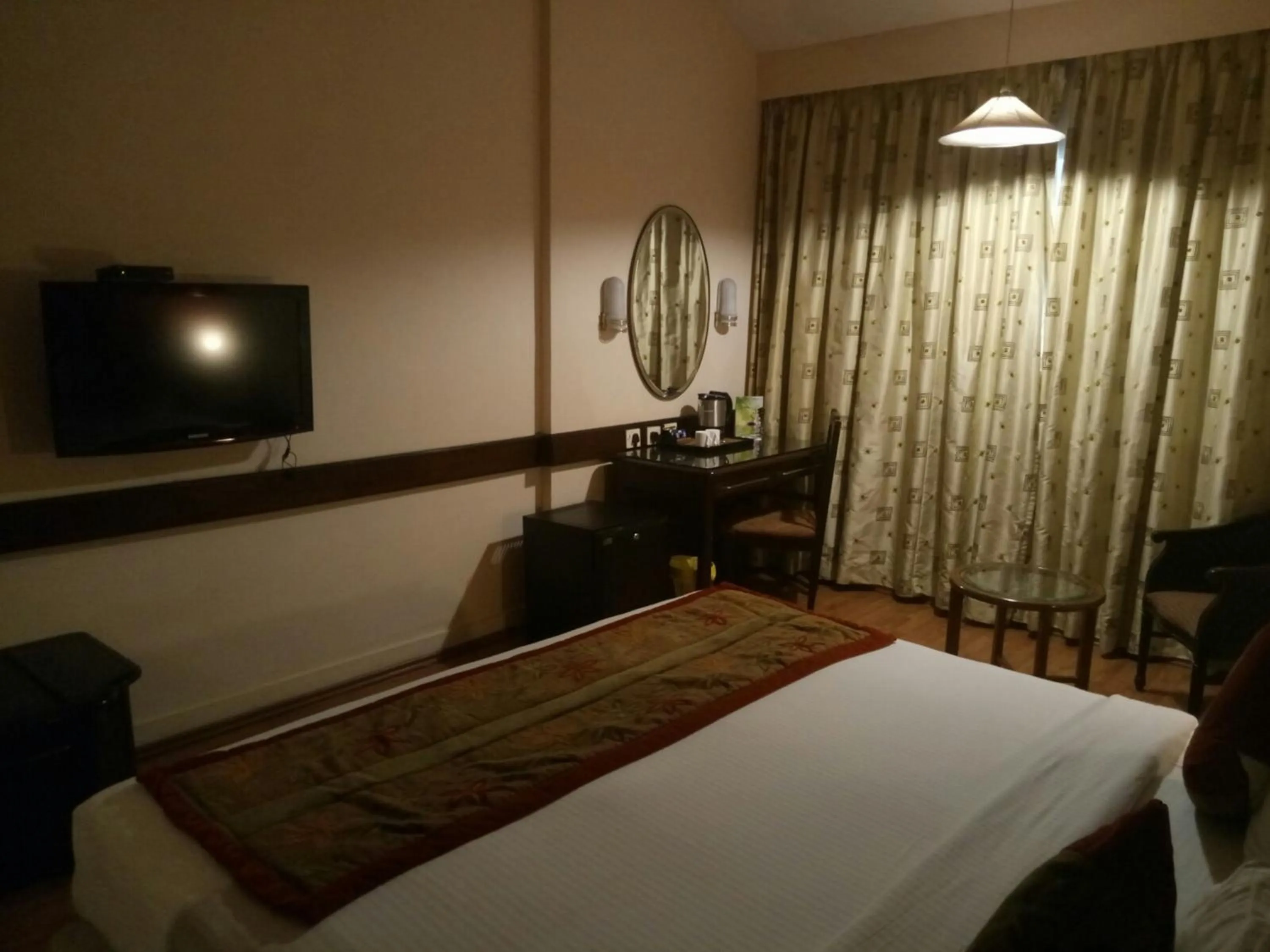 Bedroom, Bed in Ramee Guestline Hotel Bangalore