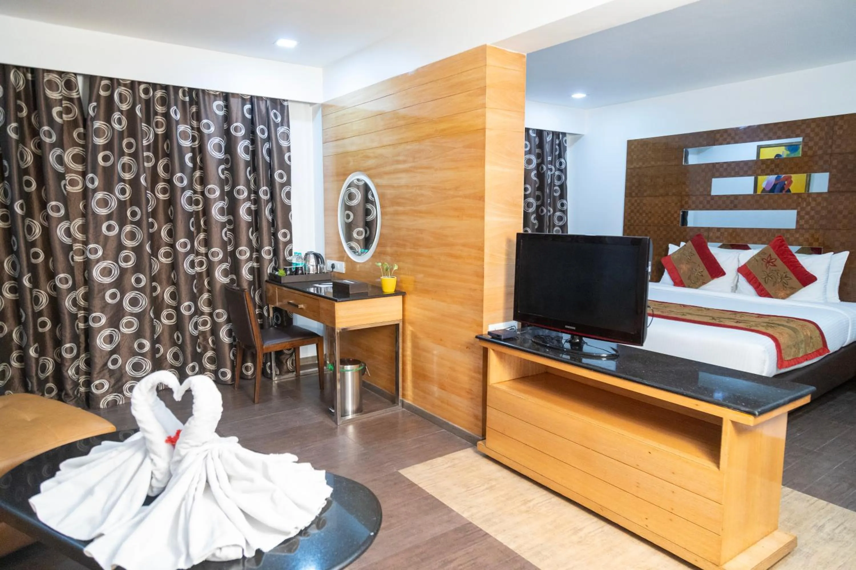 Bed in Ramee Guestline Hotel Bangalore