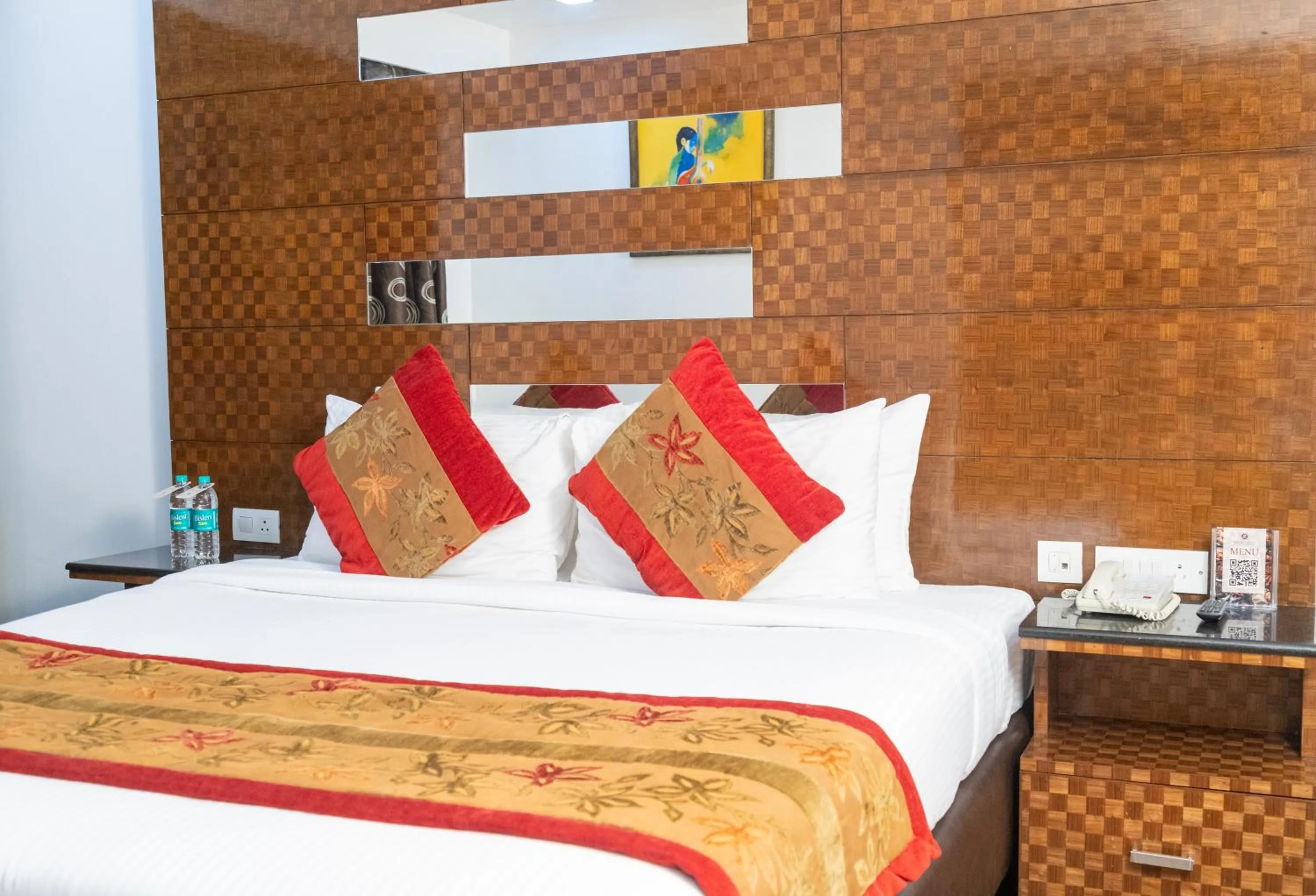 Bed in Ramee Guestline Hotel Bangalore