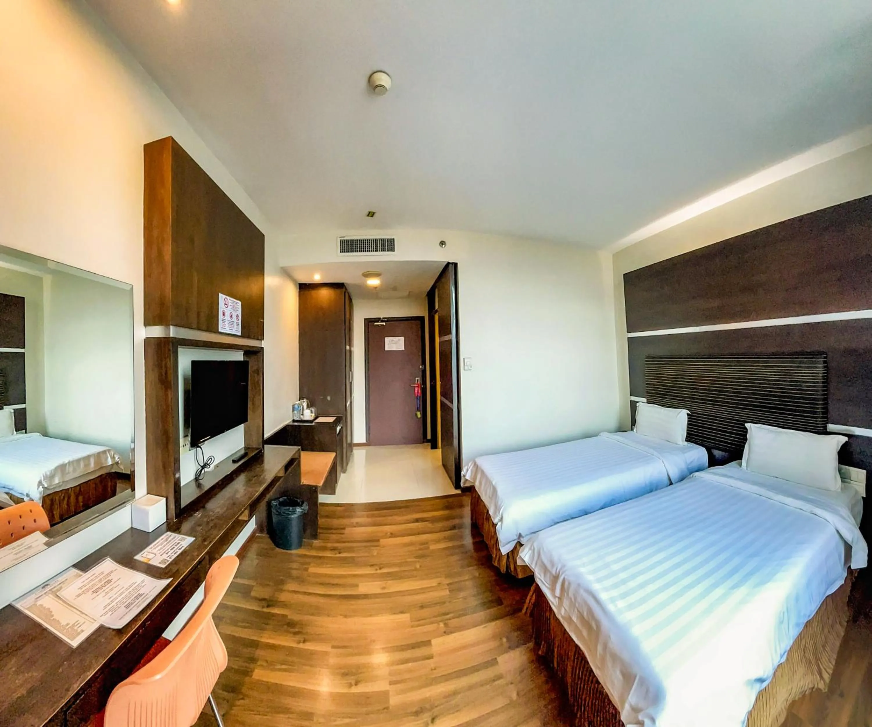 Bed in Courtyard Hotel 1Borneo