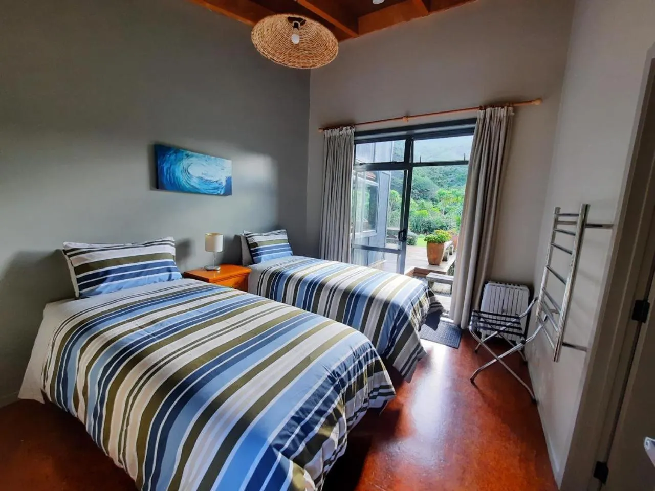 Photo of the whole room, Bed in Piha Beachstay Accommodation