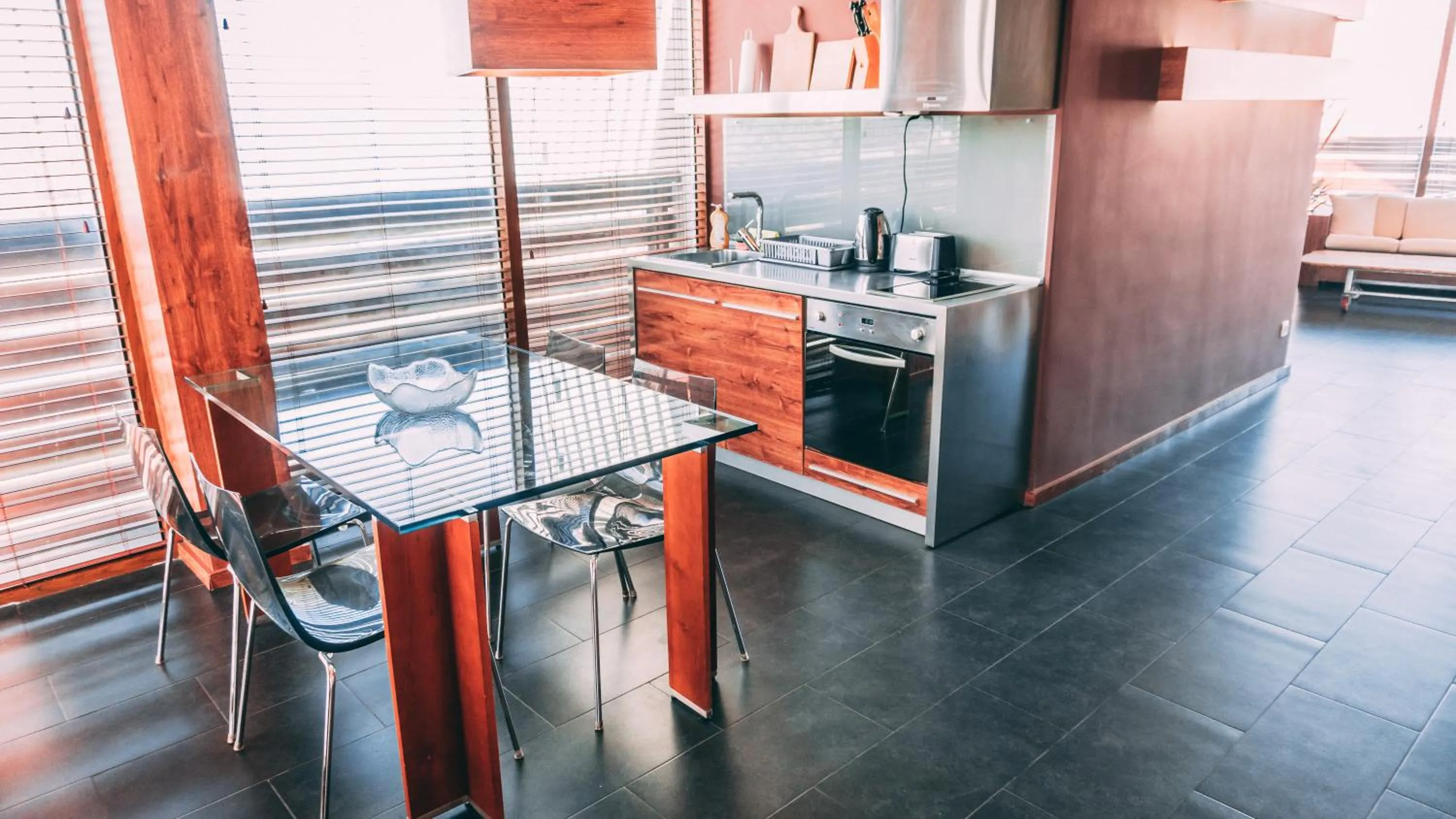 Kitchen or kitchenette in Design Hotel Logatero
