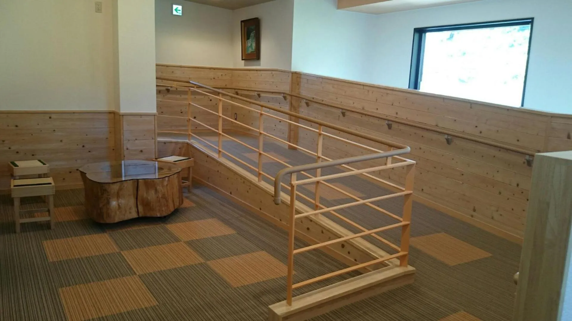 Communal lounge/ TV room in Nezame Hotel