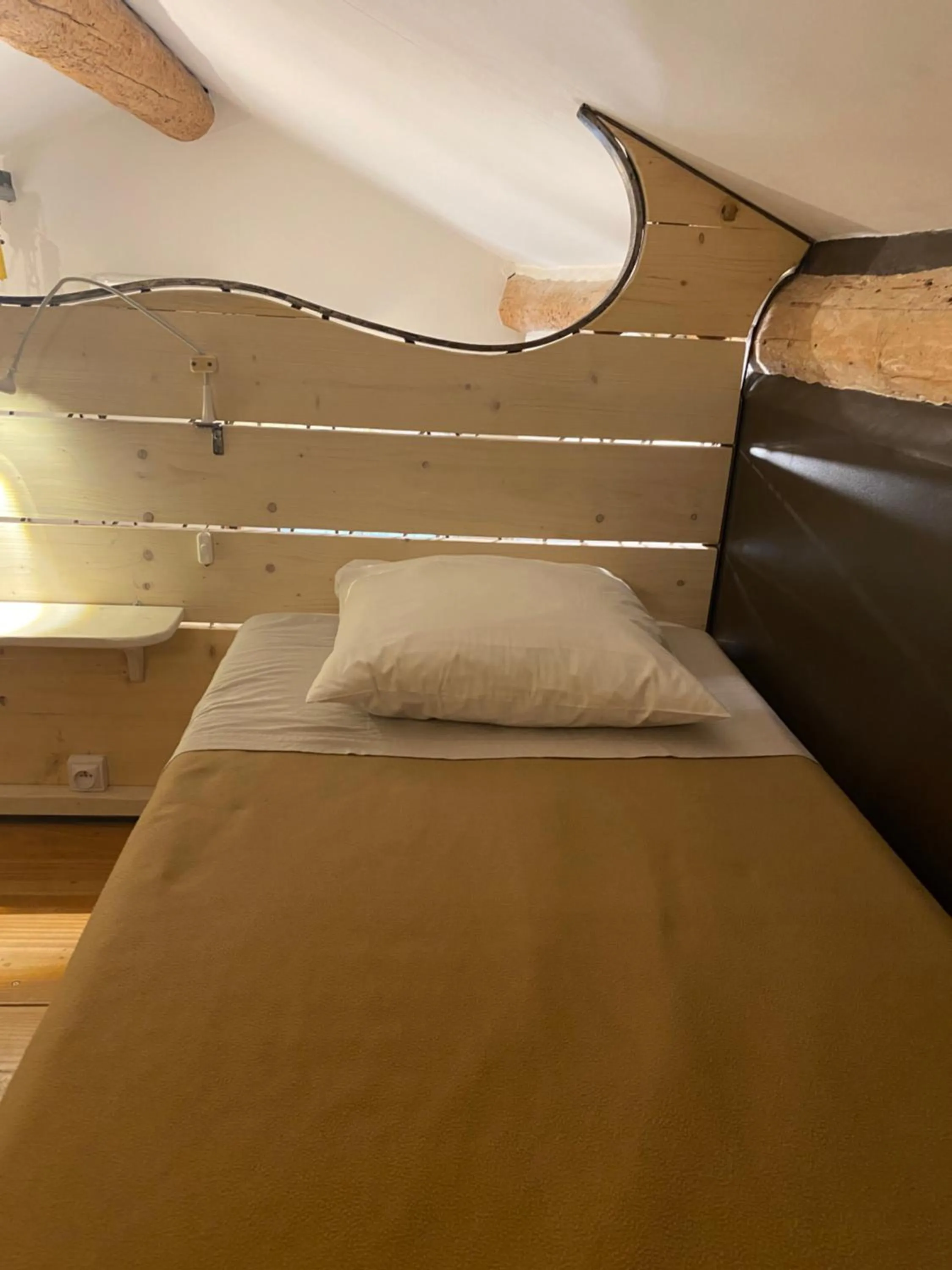 Bed in L'atelier B&B