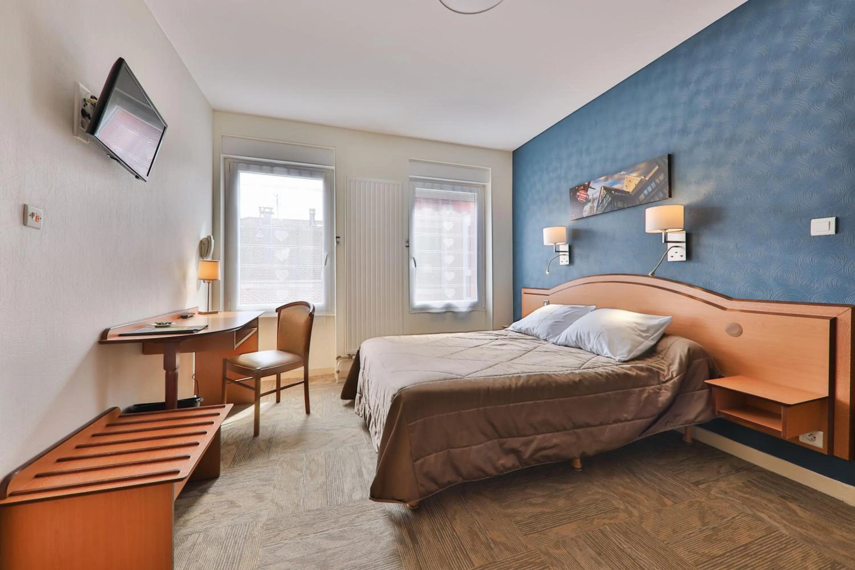 Photo of the whole room, Bed in Hôtel Bar Des Vosges