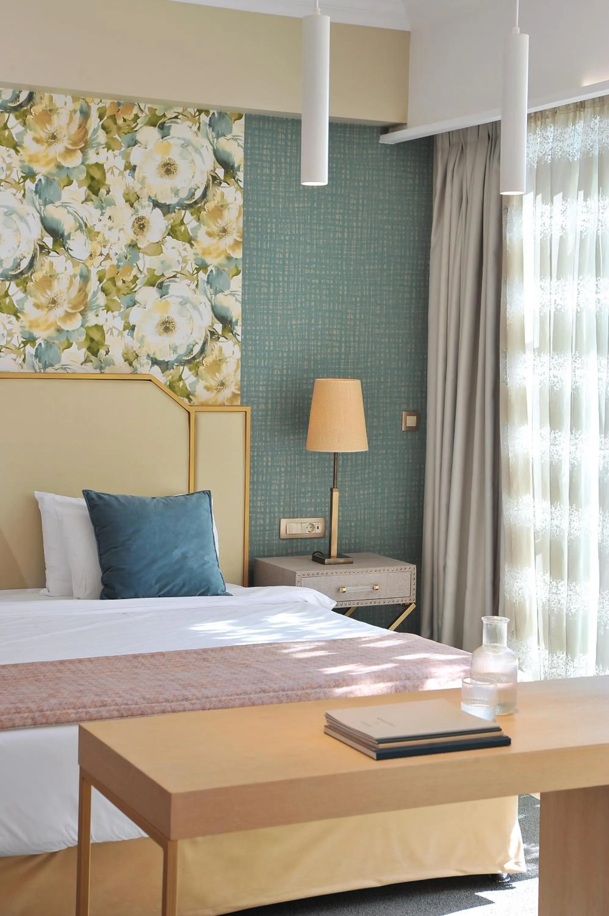 Bed in Airotel Stratos Vassilikos Hotel