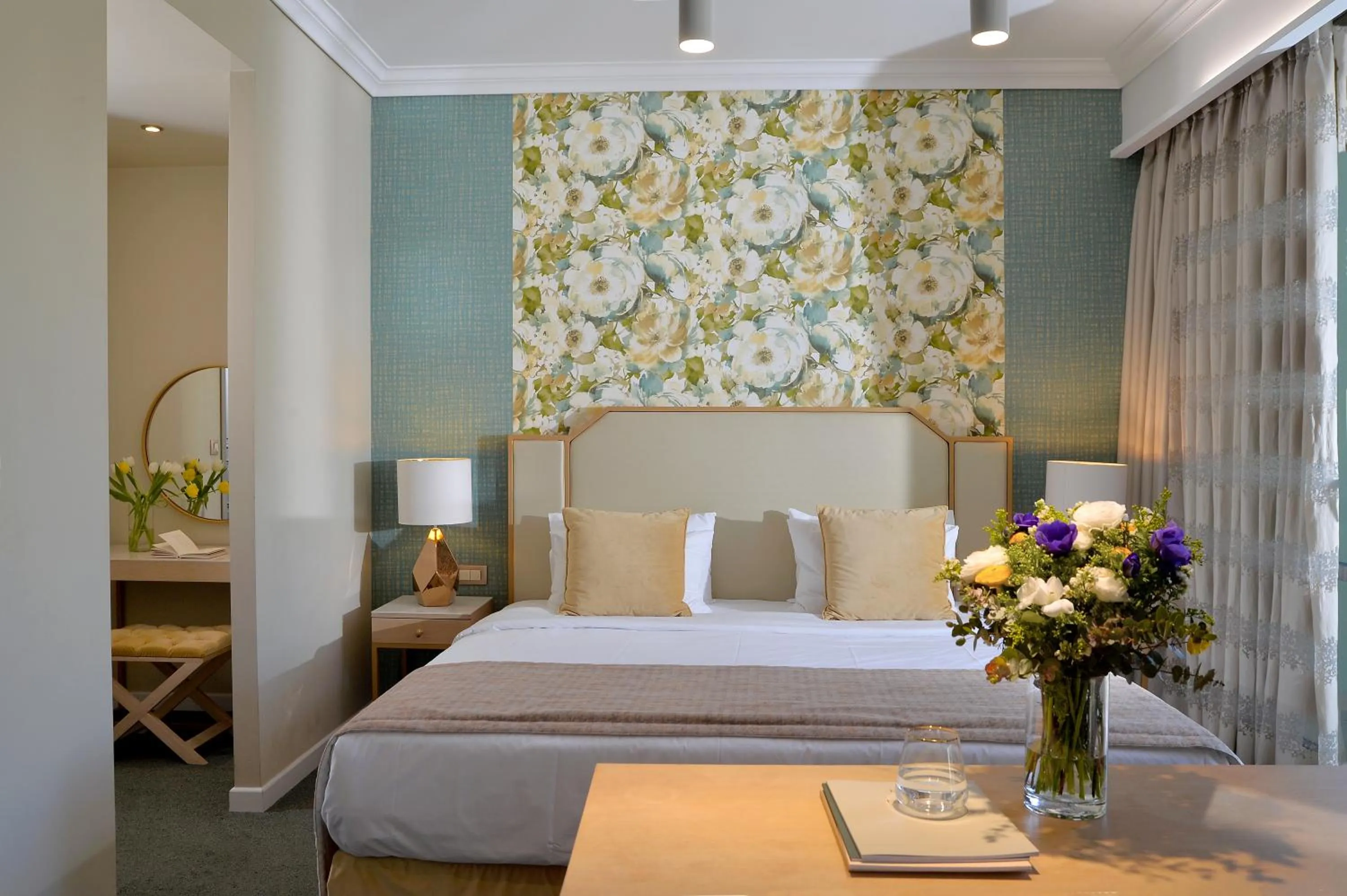 Bed in Airotel Stratos Vassilikos Hotel