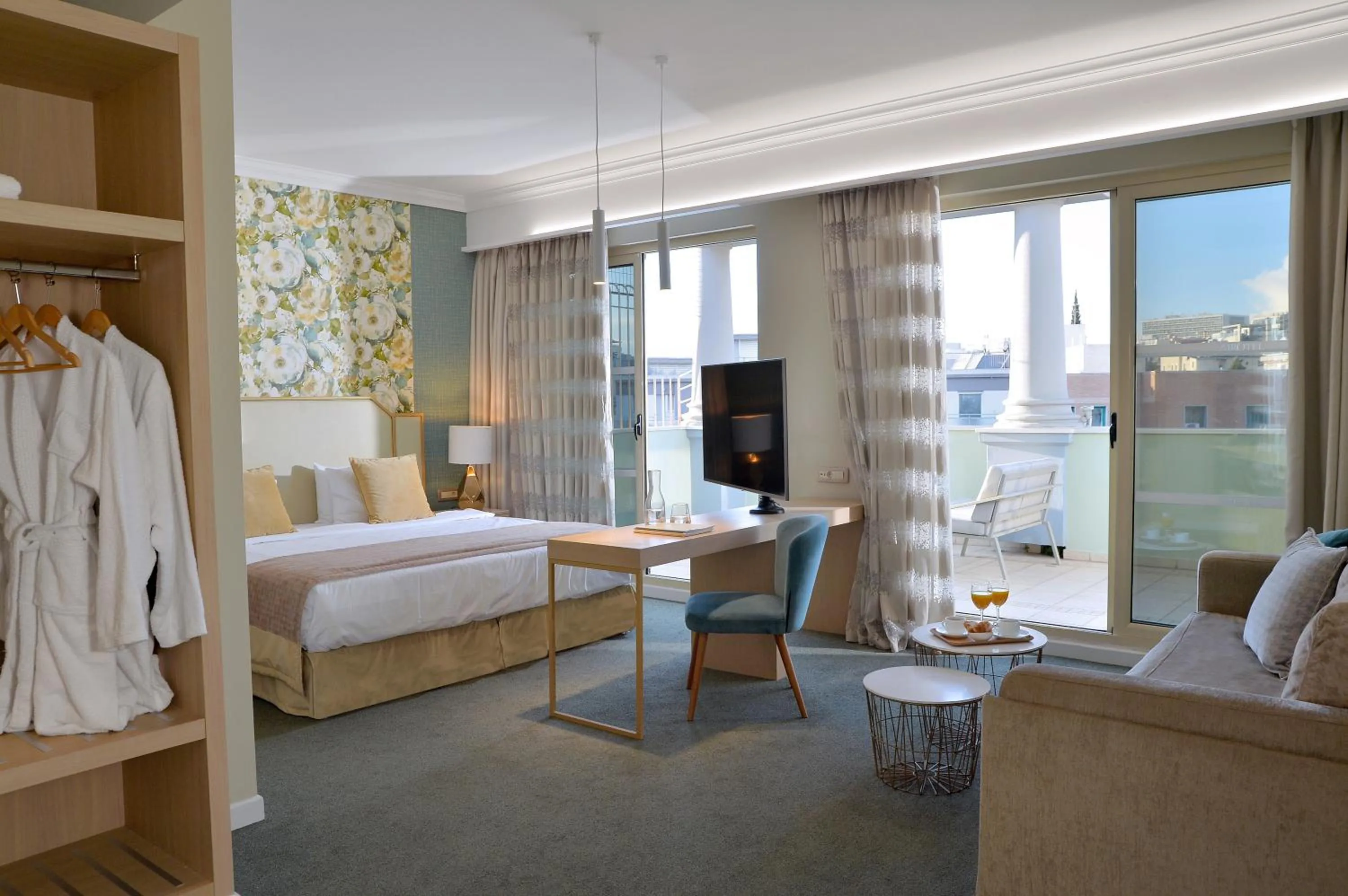 Bed in Airotel Stratos Vassilikos Hotel