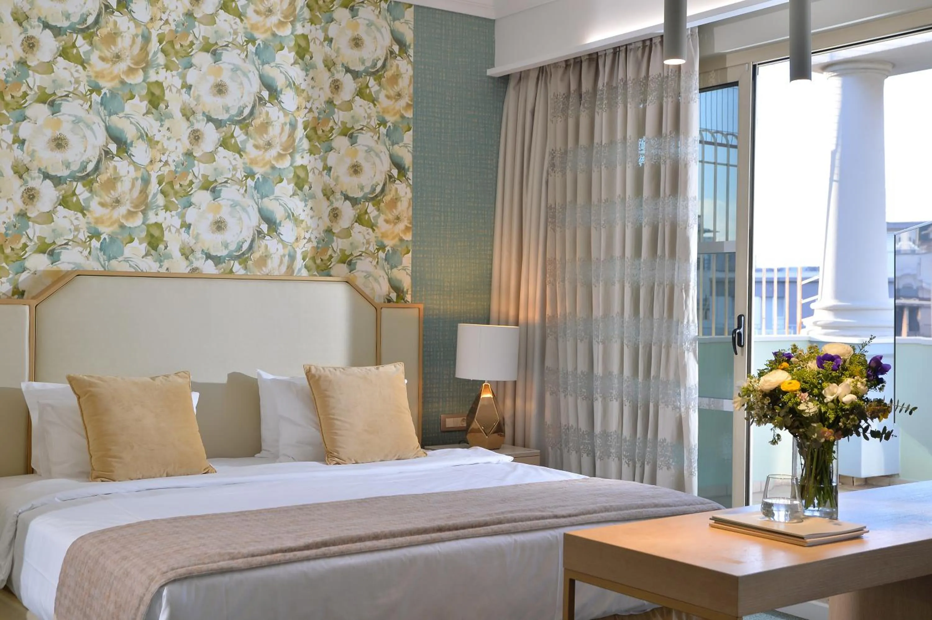 Bed in Airotel Stratos Vassilikos Hotel