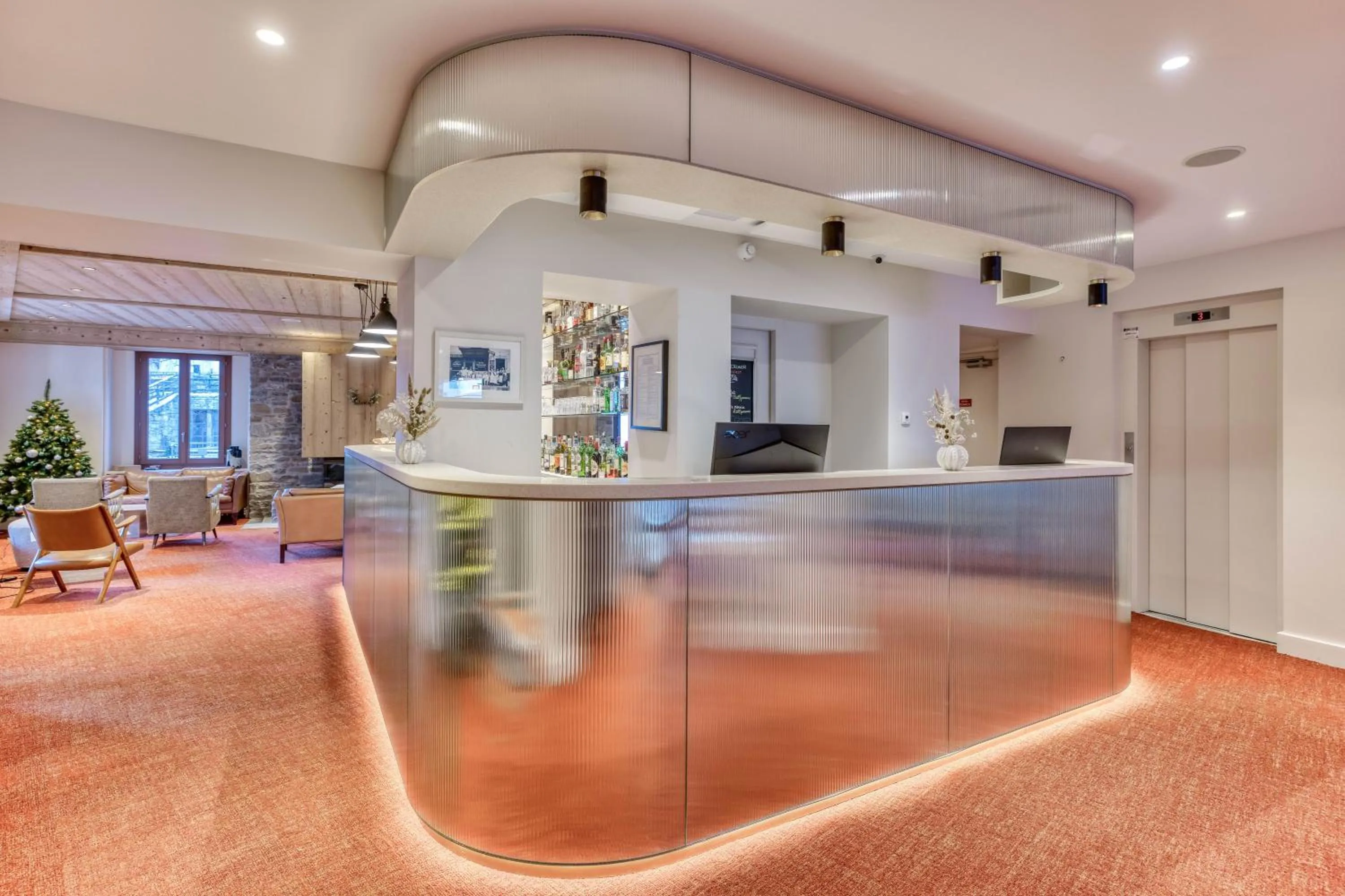 Lobby or reception in Les Gourmets - Chalet Hotel