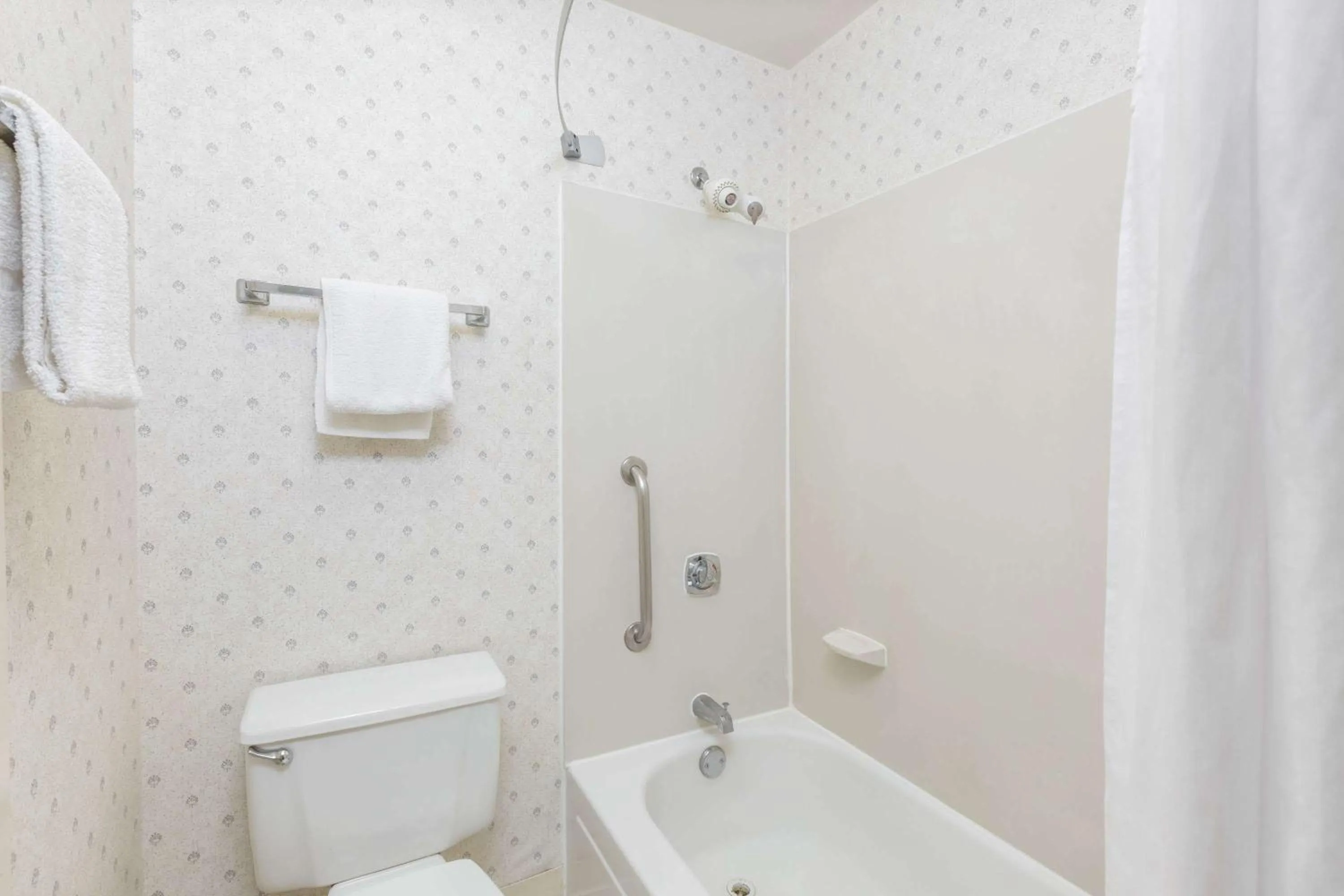 Bathroom in Days Inn by Wyndham West Des Moines - Clive