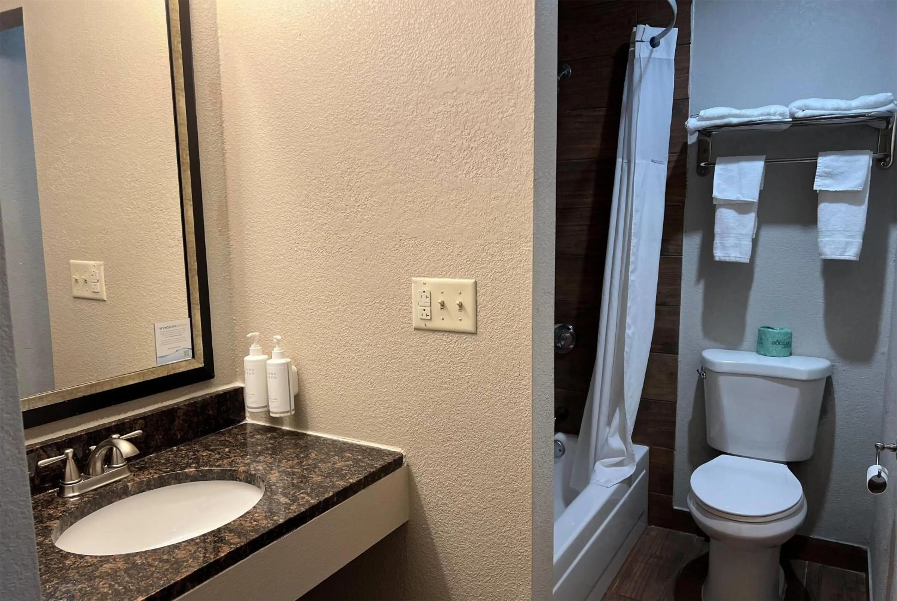 Bathroom in Days Inn by Wyndham West Des Moines - Clive