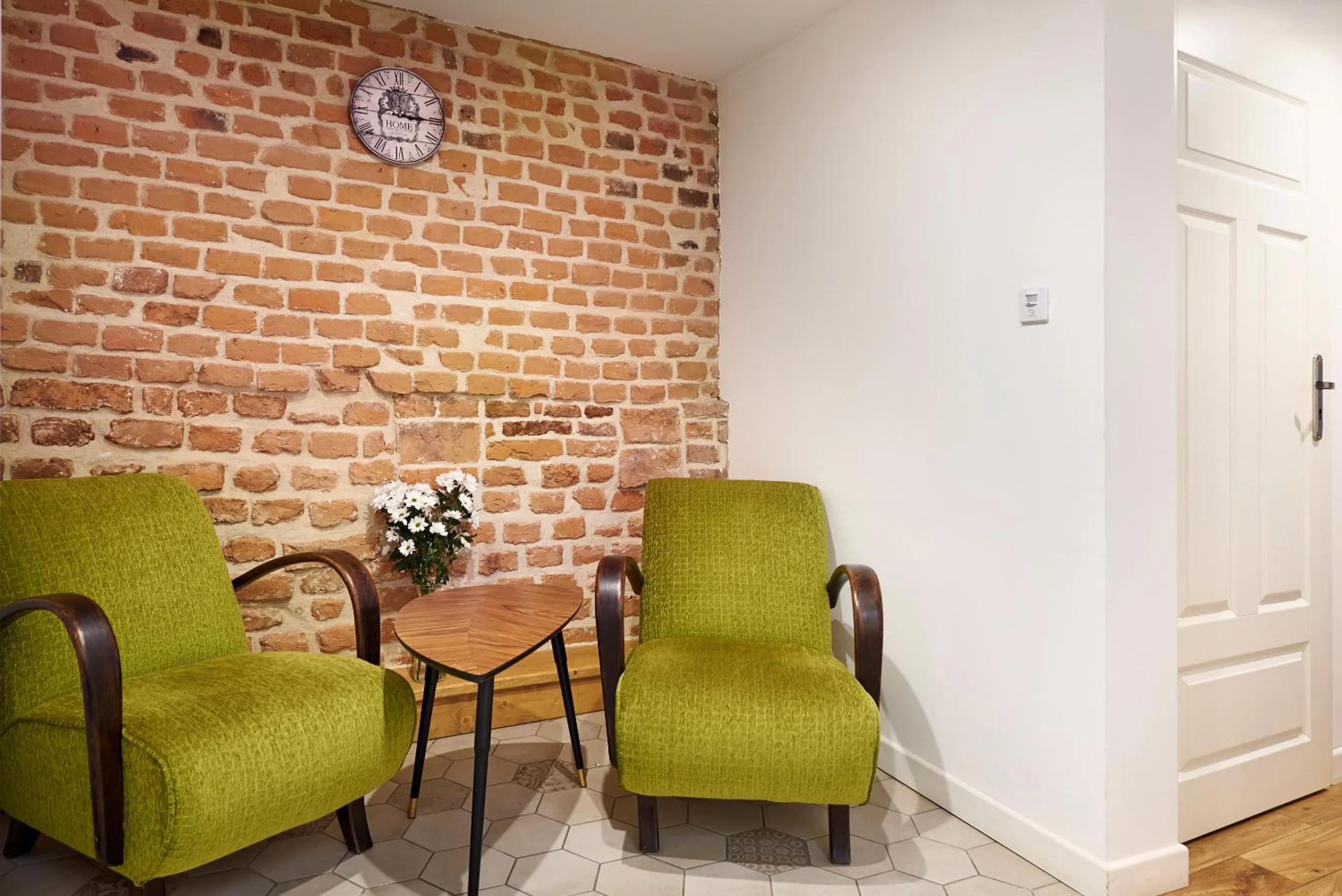 Seating area in Gołębia 8 Residence