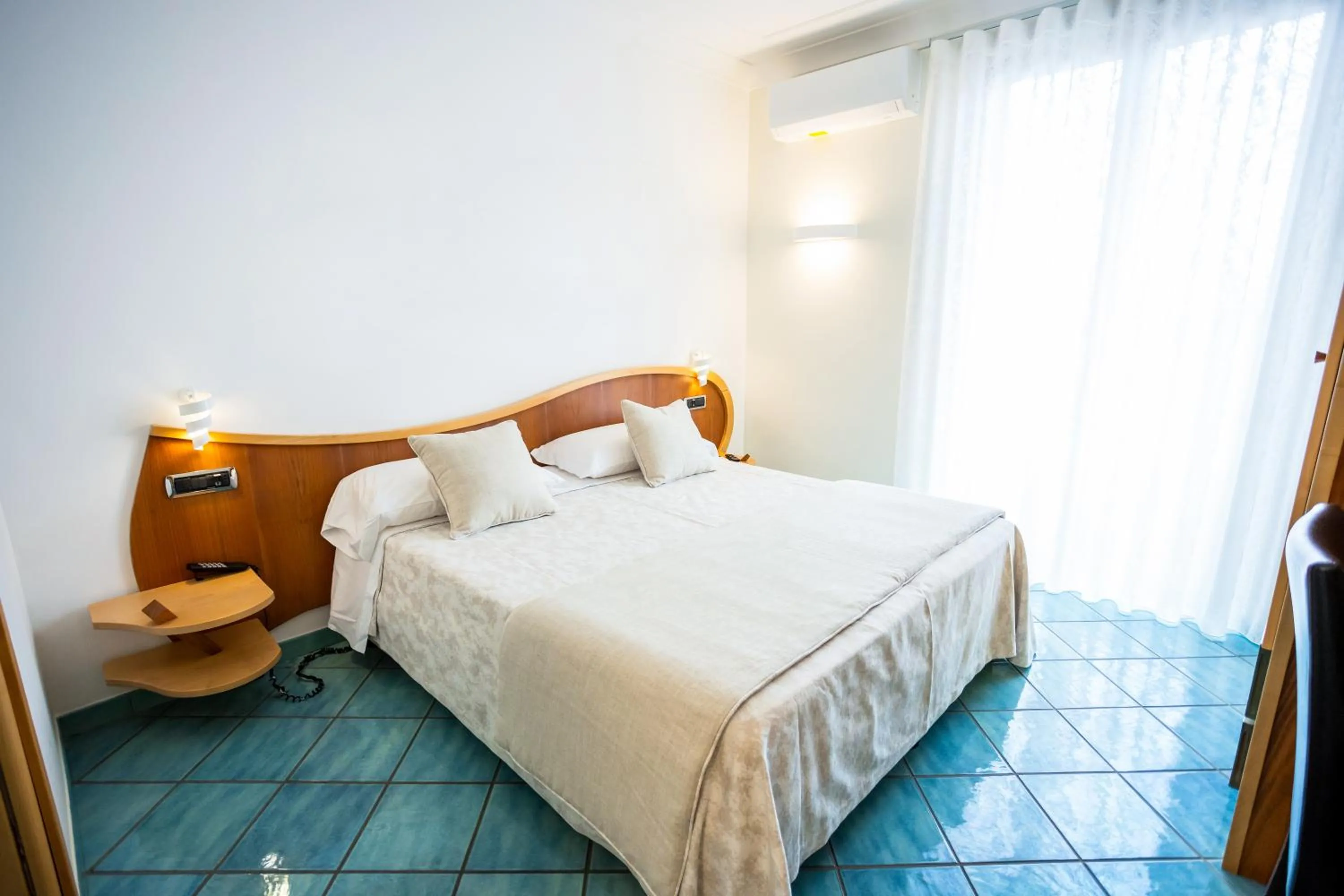 Bed in Il Principe Resort