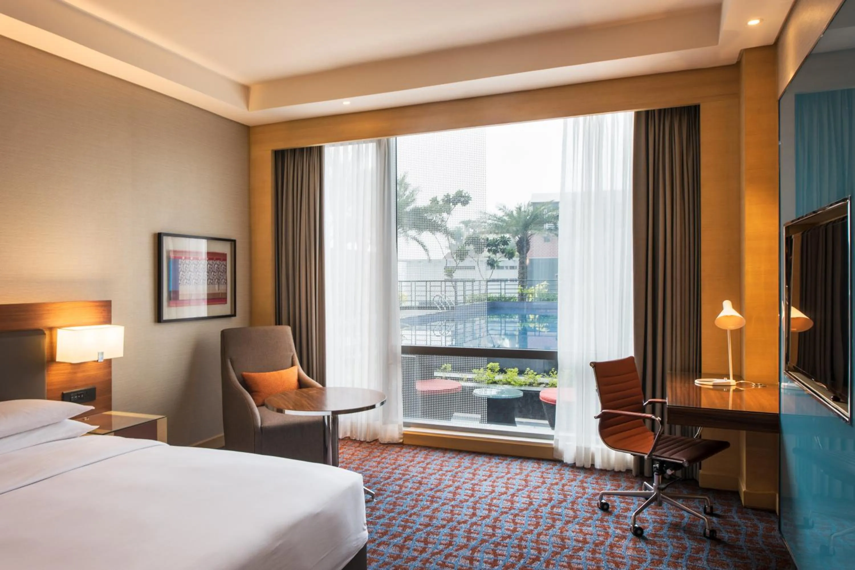 Pool view, Bed in Hyatt Regency Lucknow Gomti Nagar