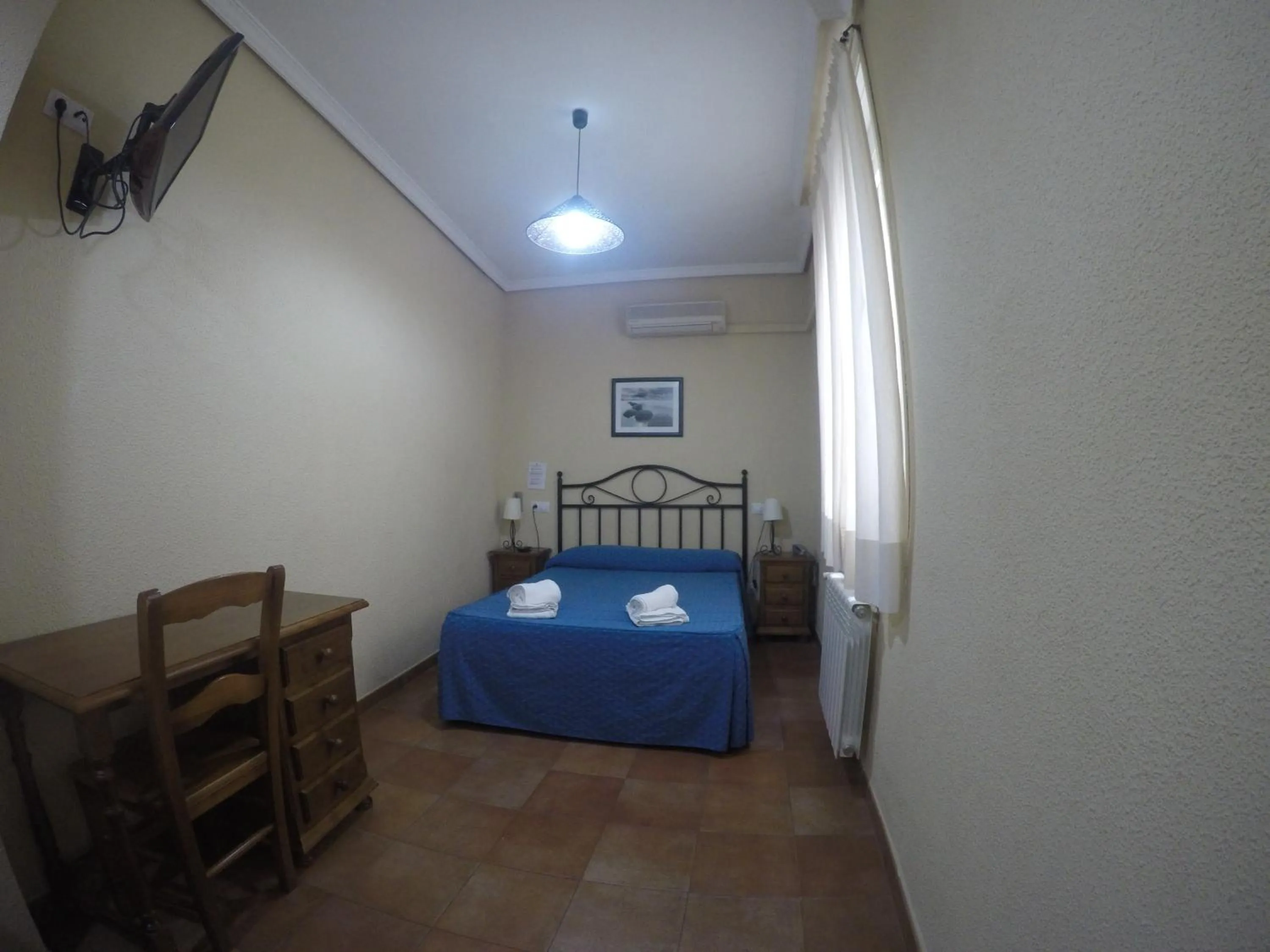 Bedroom, Bed in Hostal El Pilar