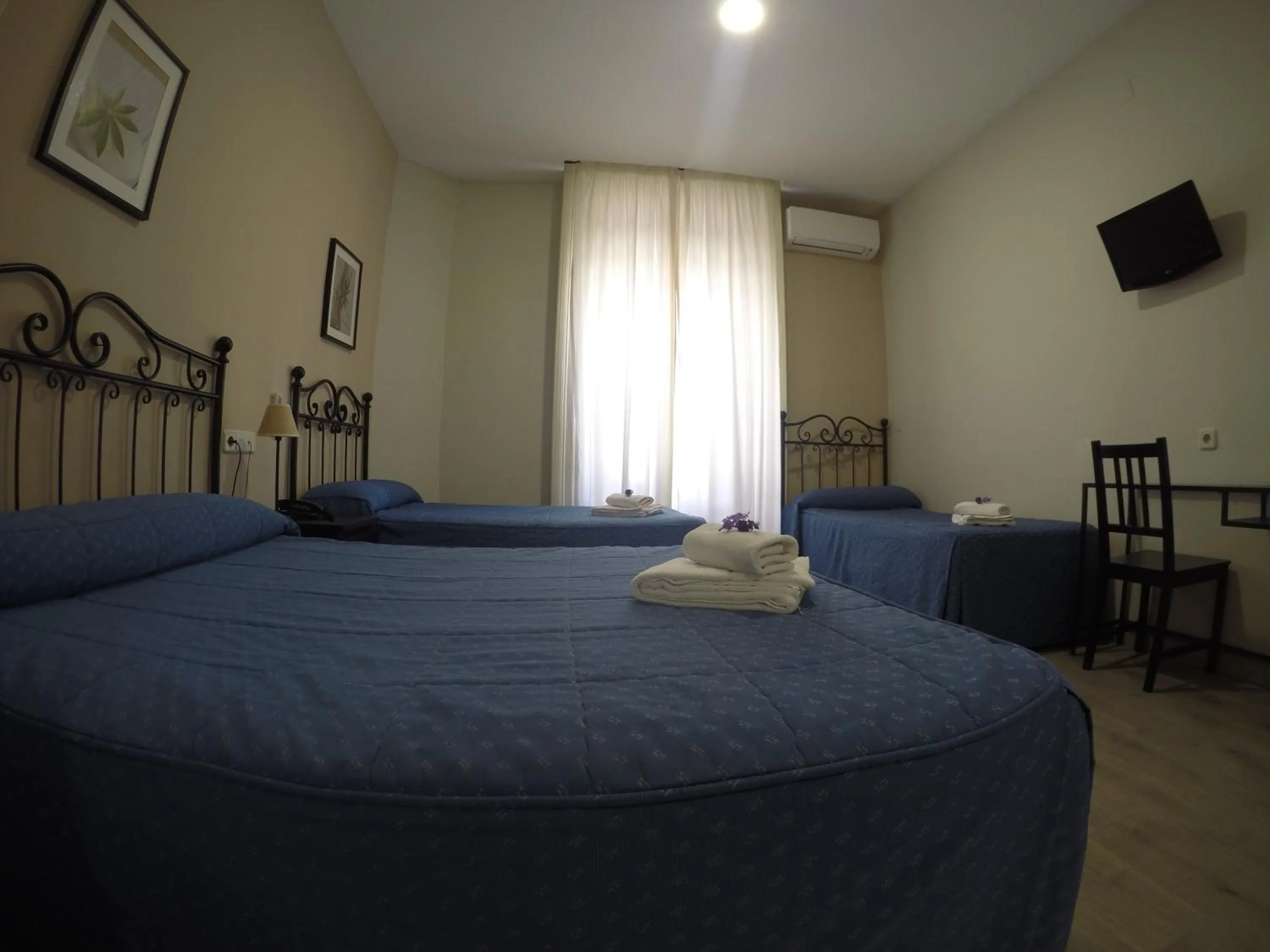 Bedroom, Bed in Hostal El Pilar