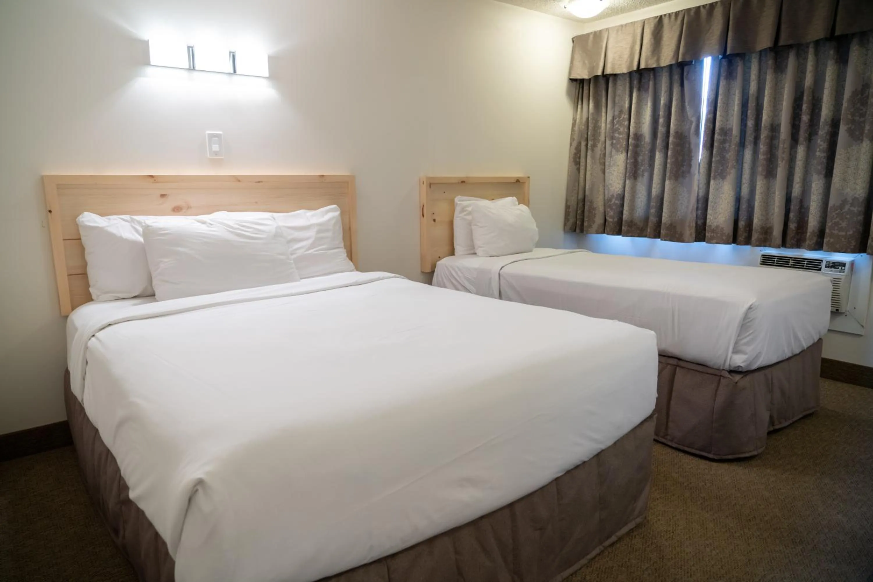 Bed in Rocky Mountain Ski Lodge