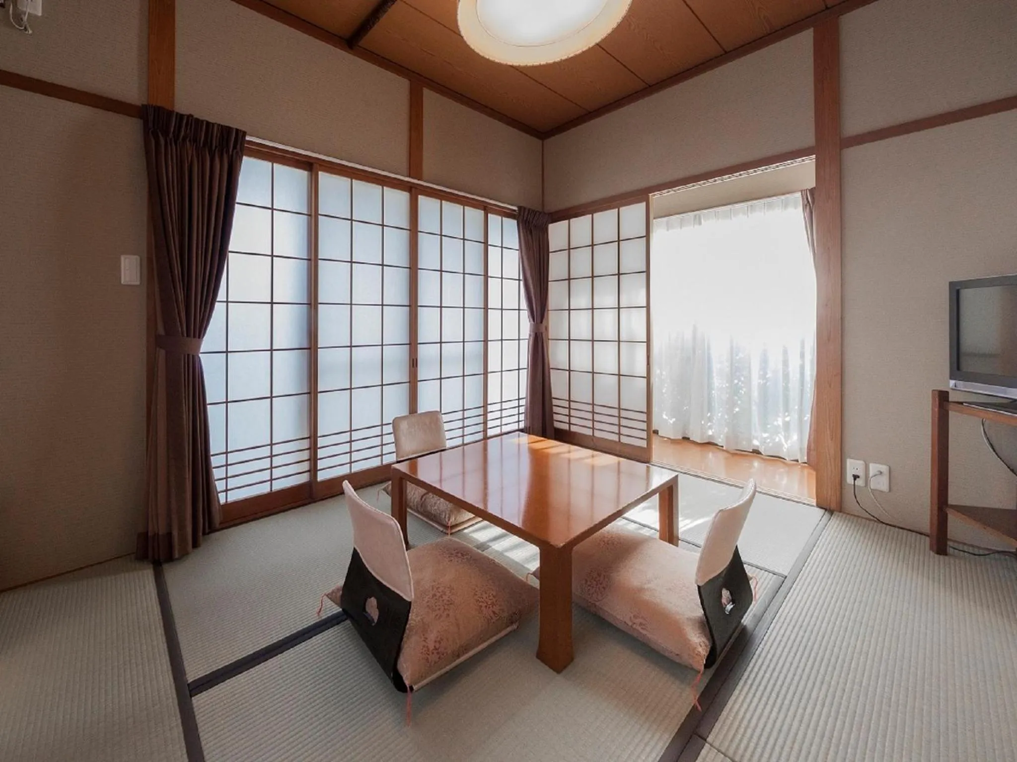 Bed in Onsen Guest House Aobato no Su