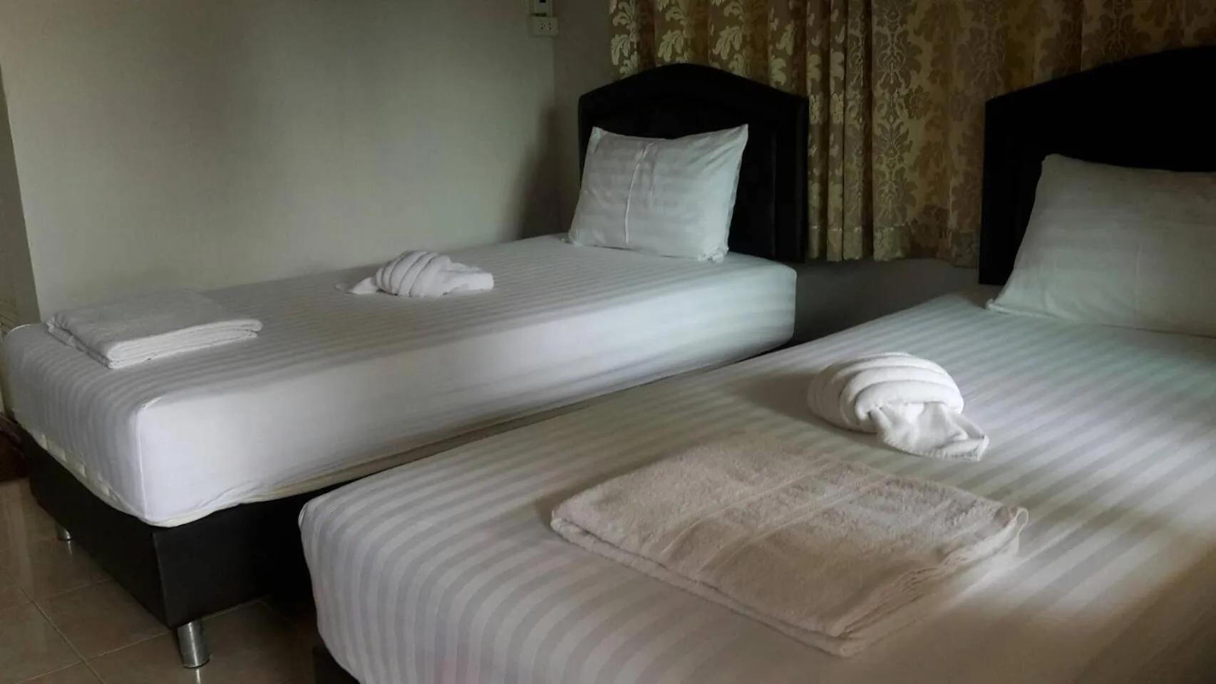 Bed in Rubtawan Sichang Resort