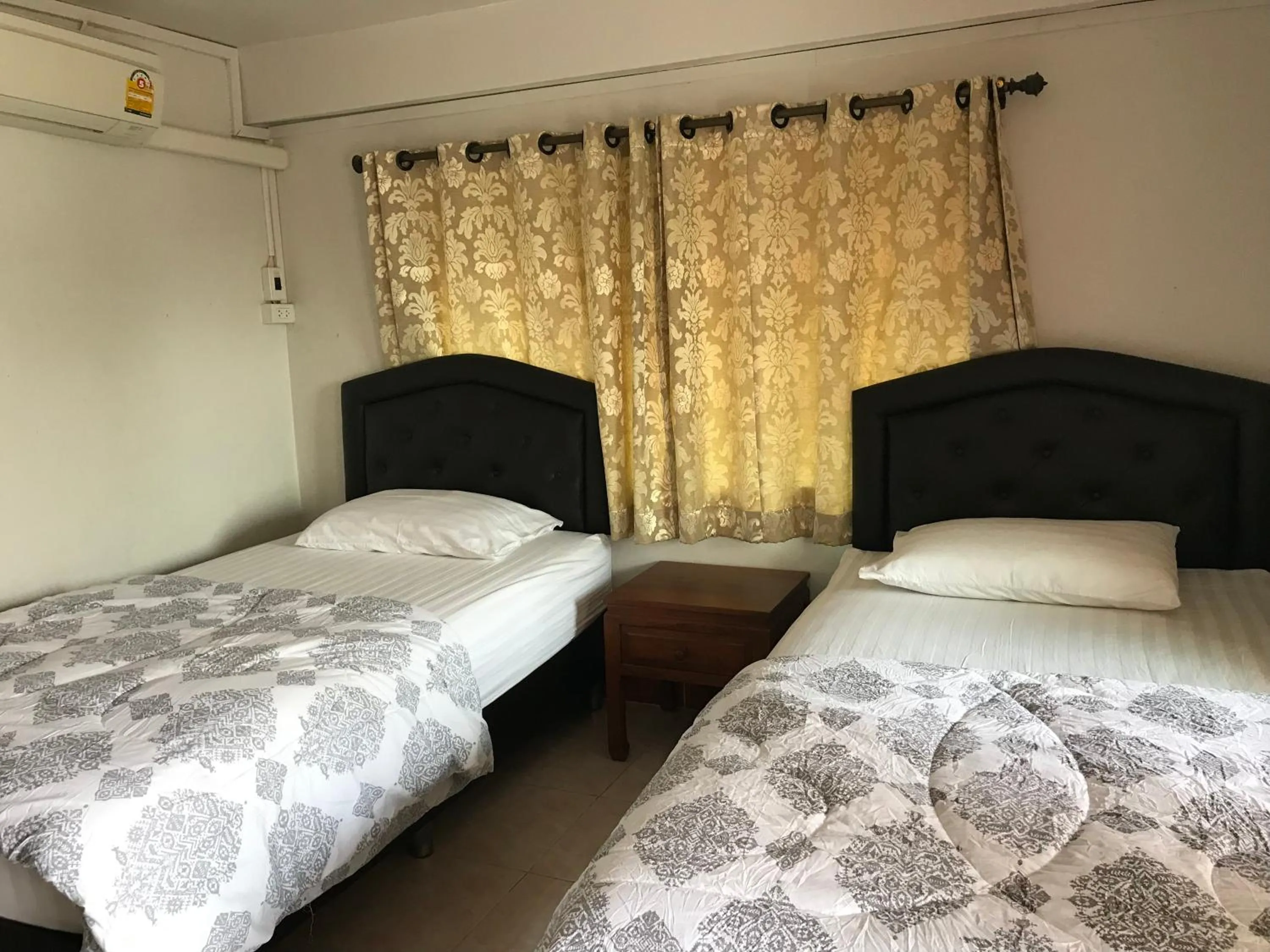 Bed in Rubtawan Sichang Resort