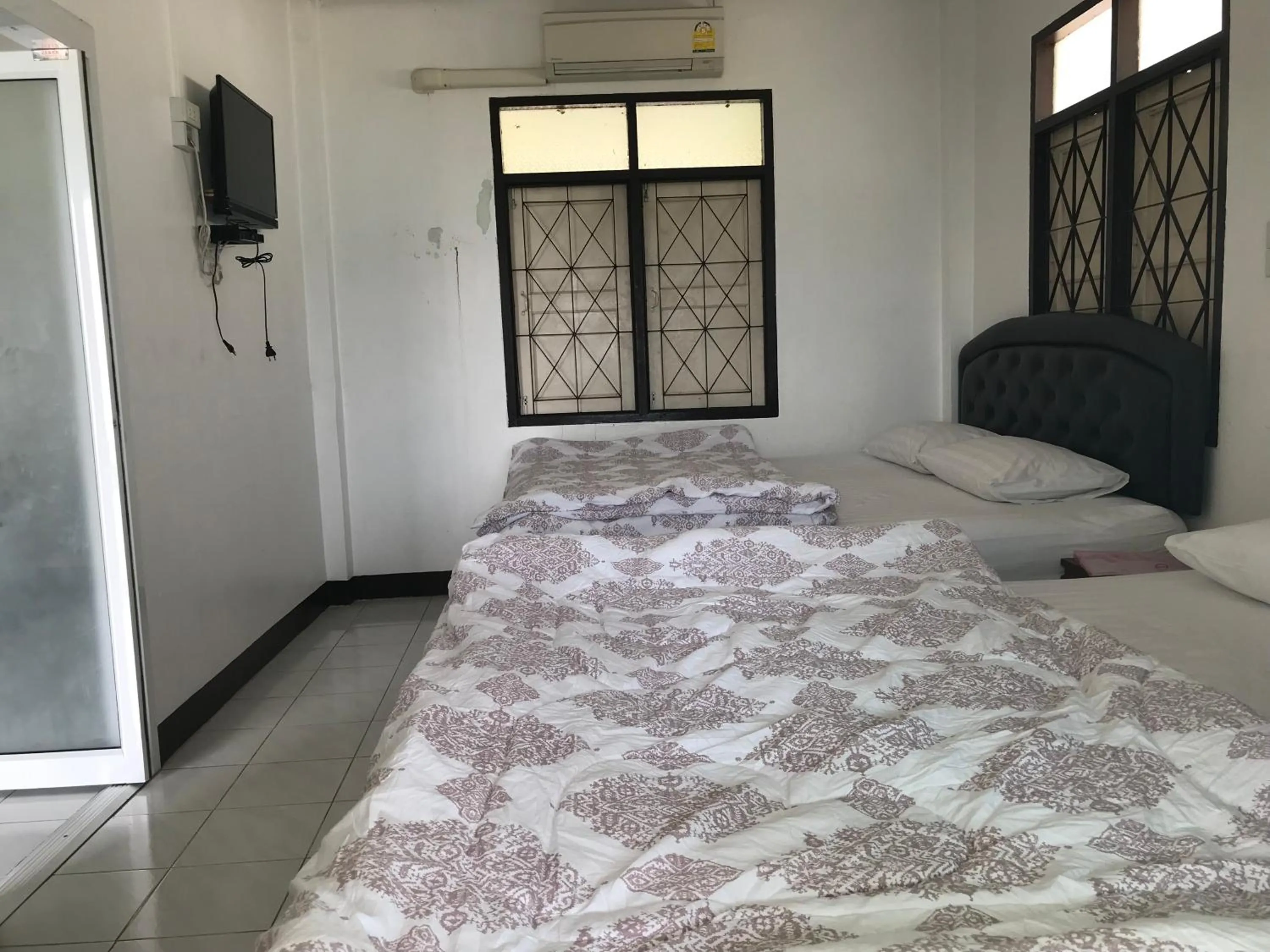 Bed in Rubtawan Sichang Resort