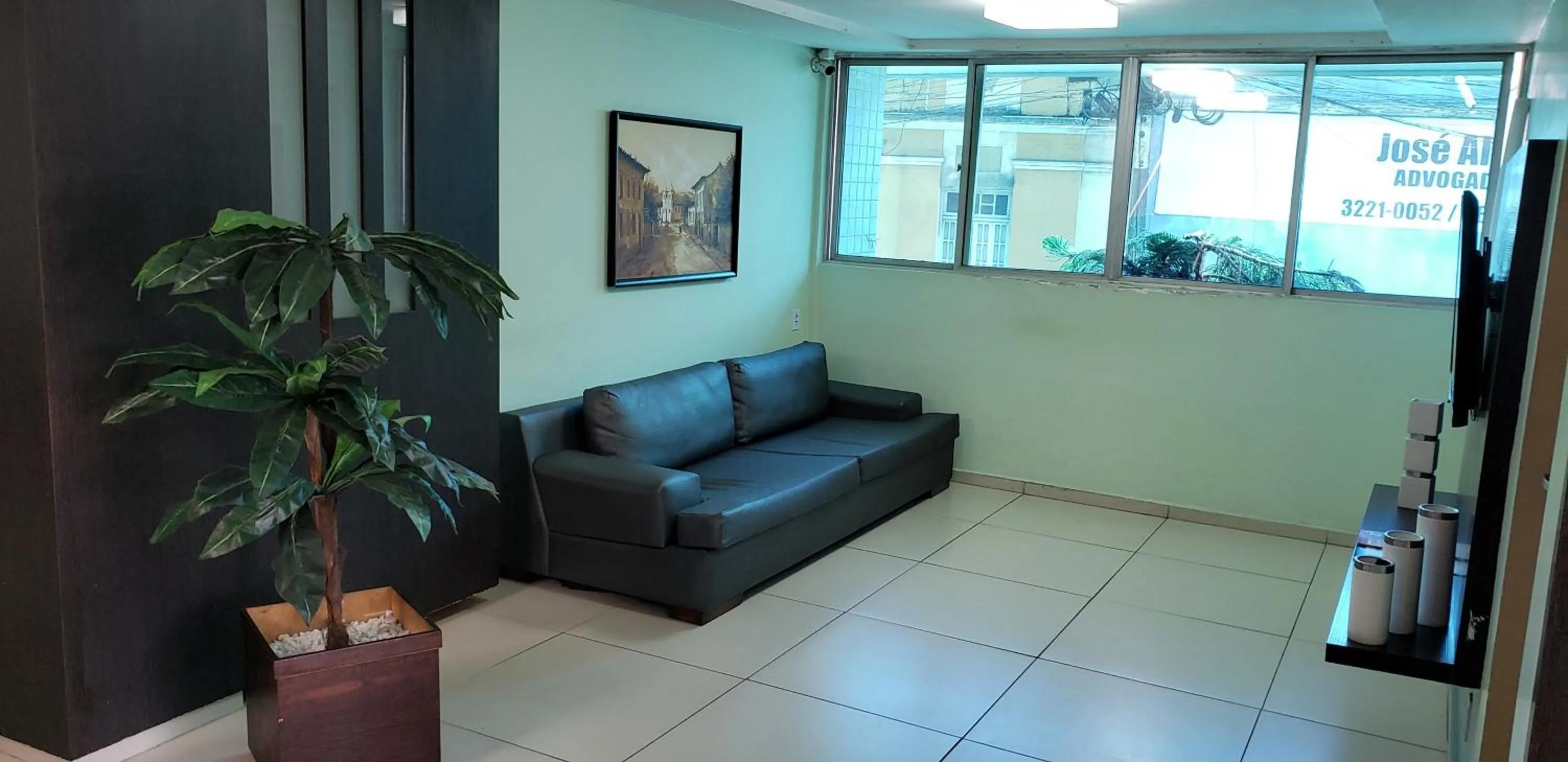 Communal lounge/ TV room in Guarany Hotel Express