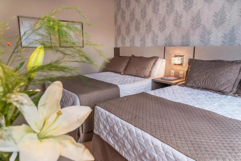 Bed in Nadai Confort Hotel e Spa