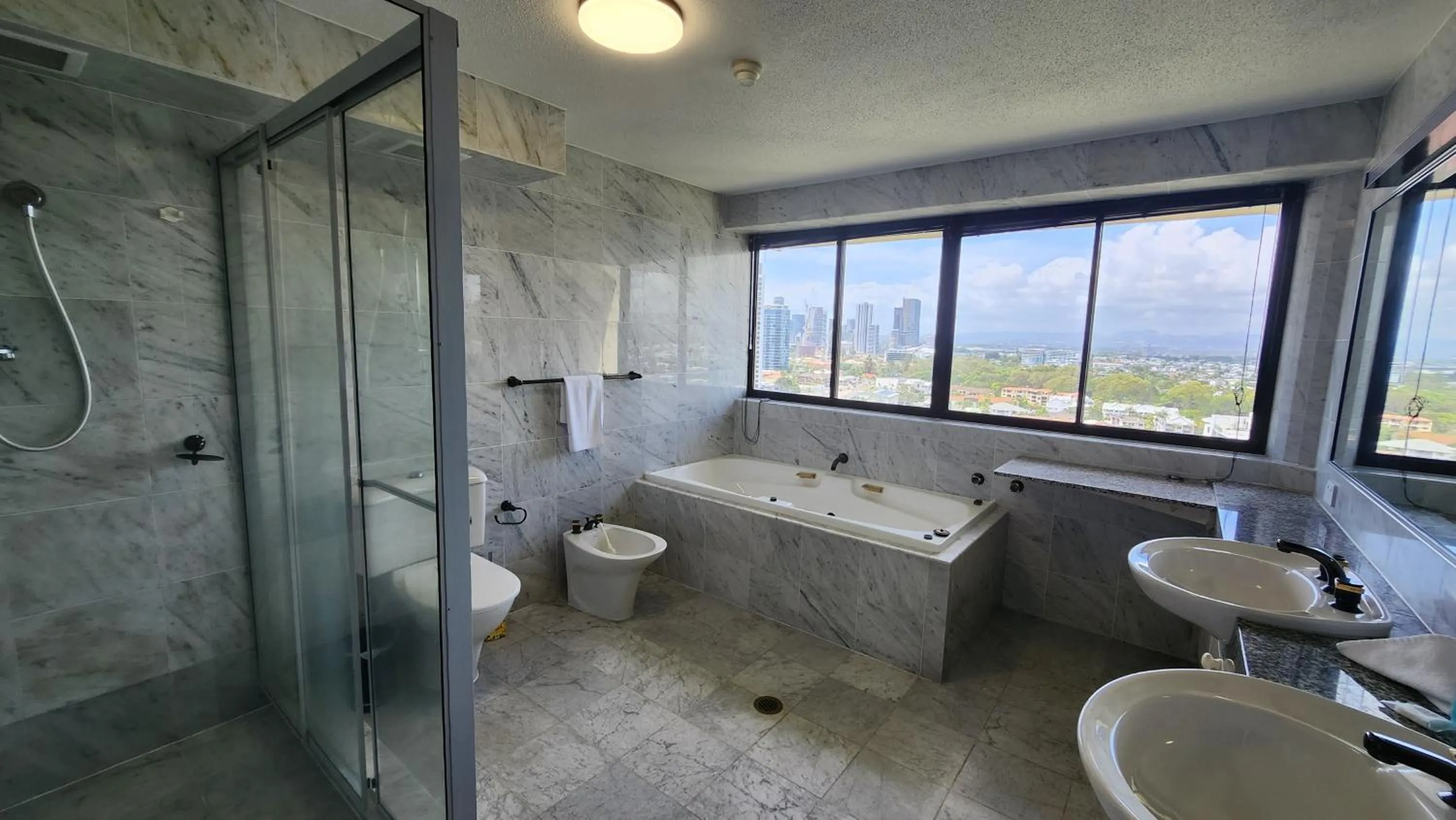 Shower in Surfers Hawaiian Holiday Apartments