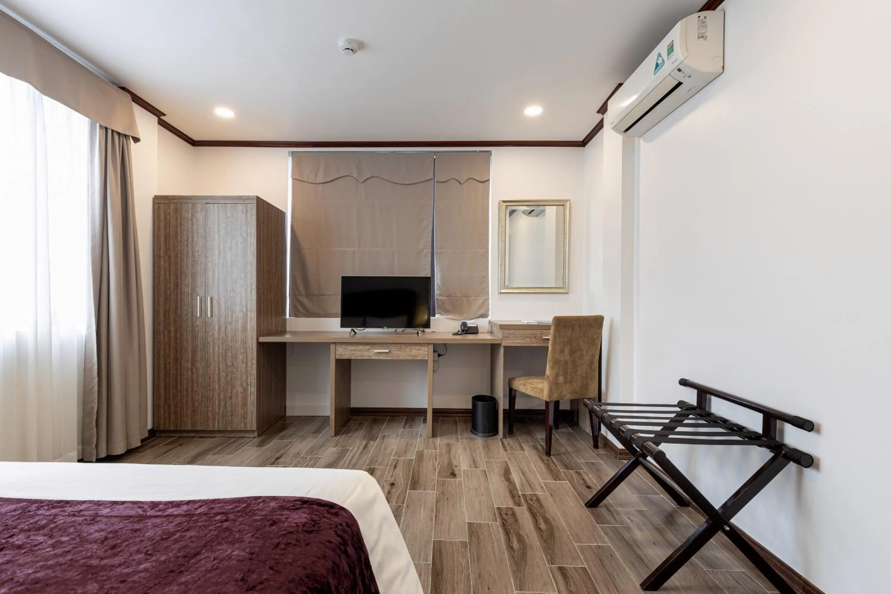 Bed in Flower Garden Hotel