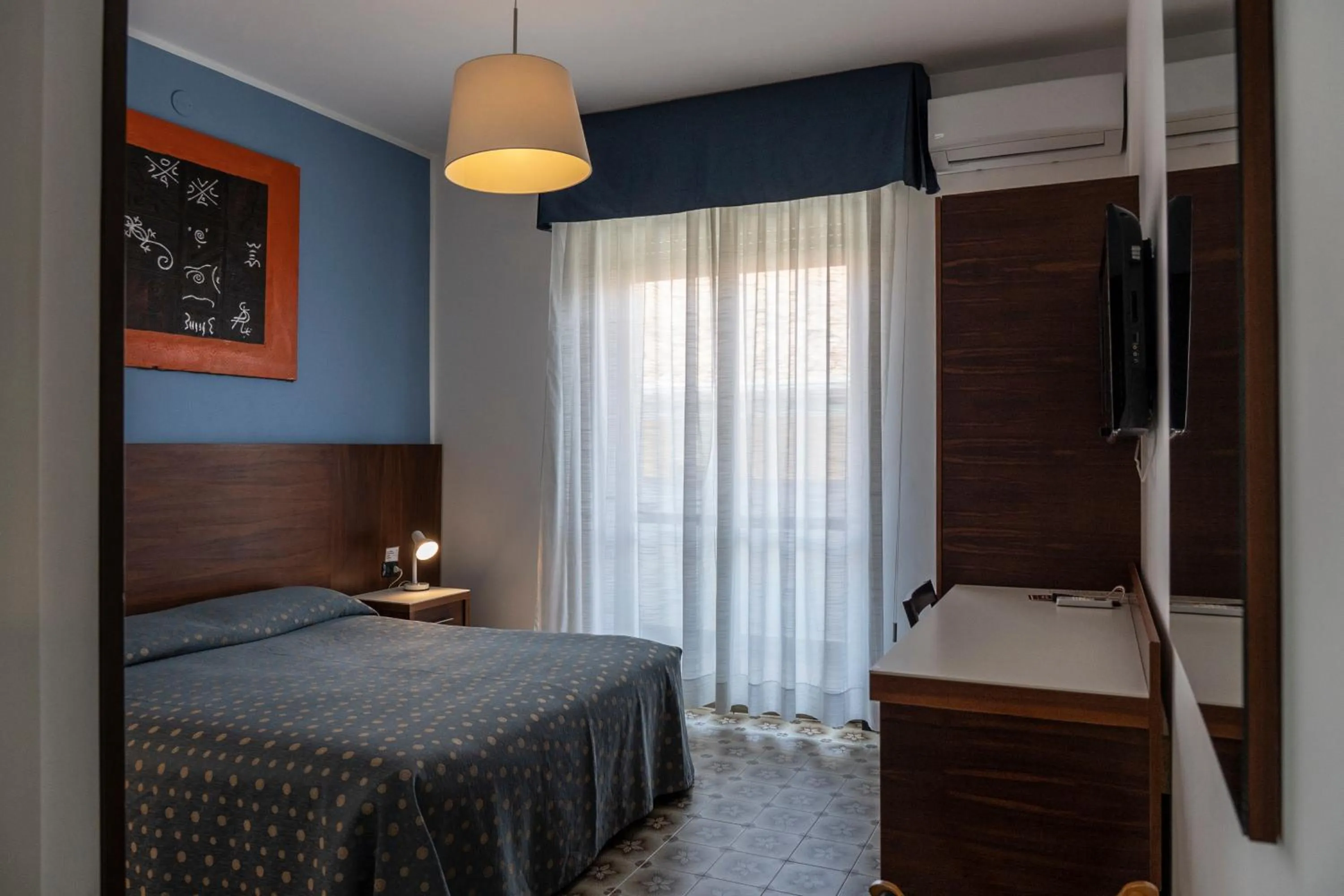 Bedroom in Hotel Mare Blu
