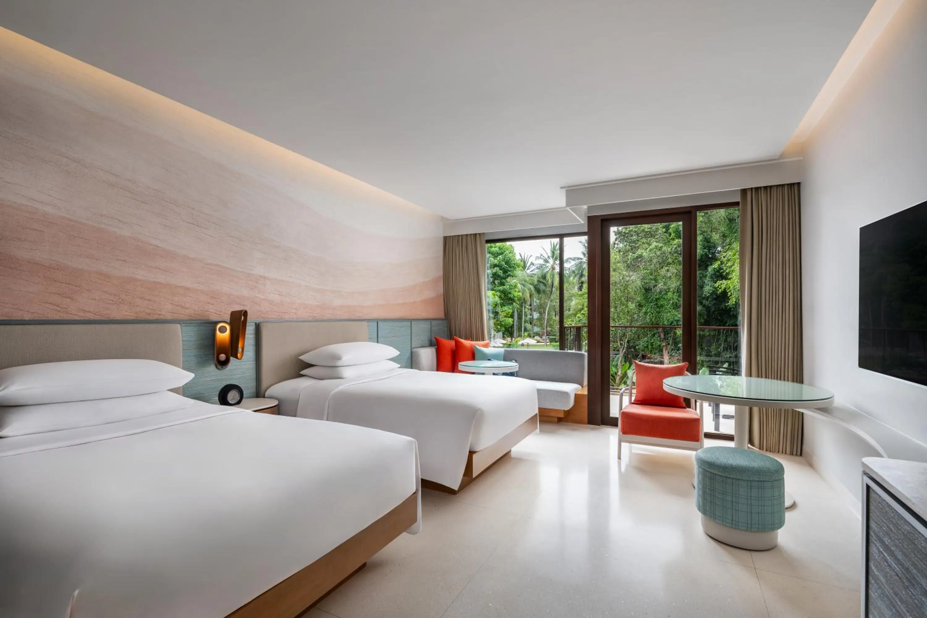 Communal lounge/ TV room, Bed in Renaissance Phuket Resort & Spa