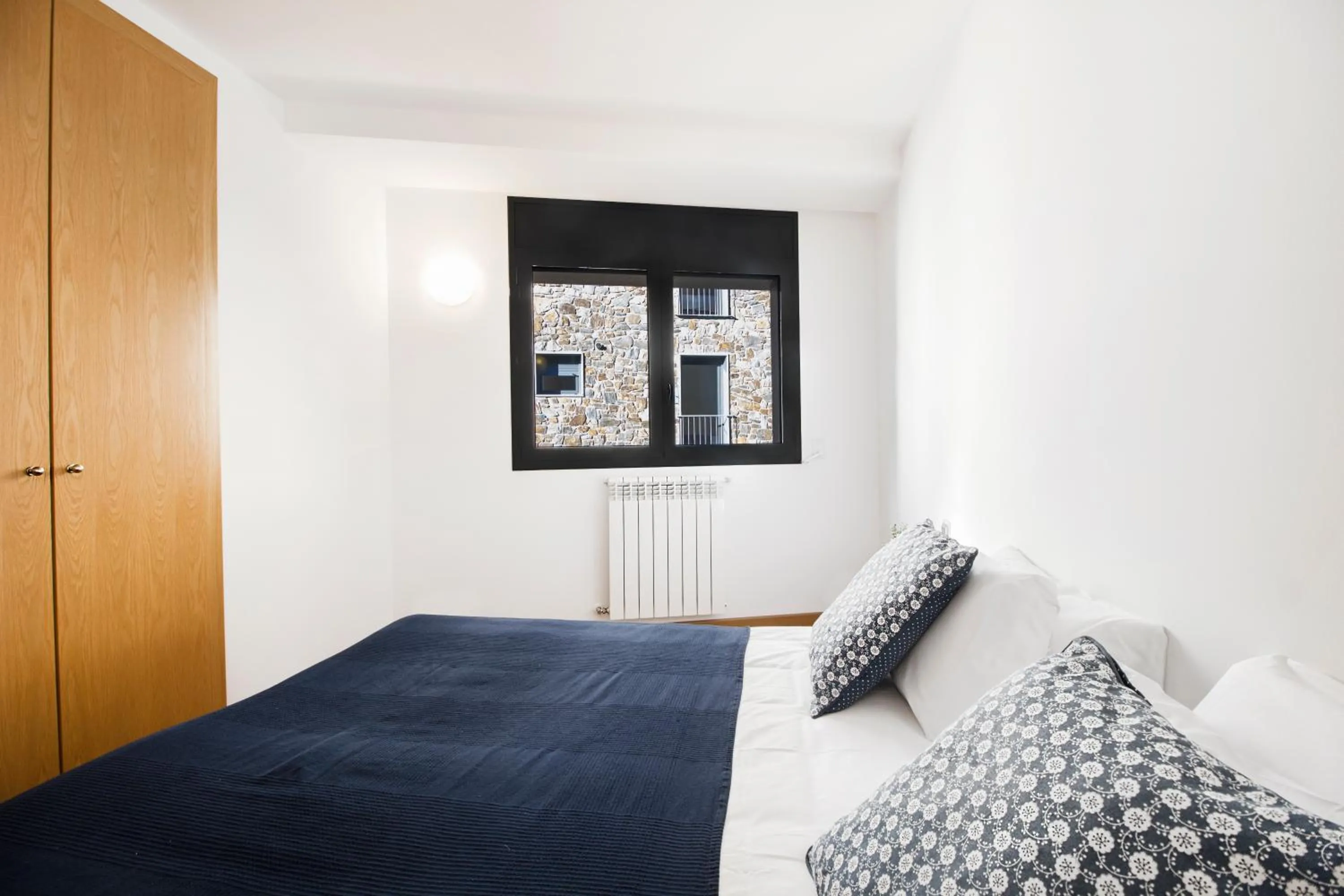 Bed in Font del Ferro Apartments