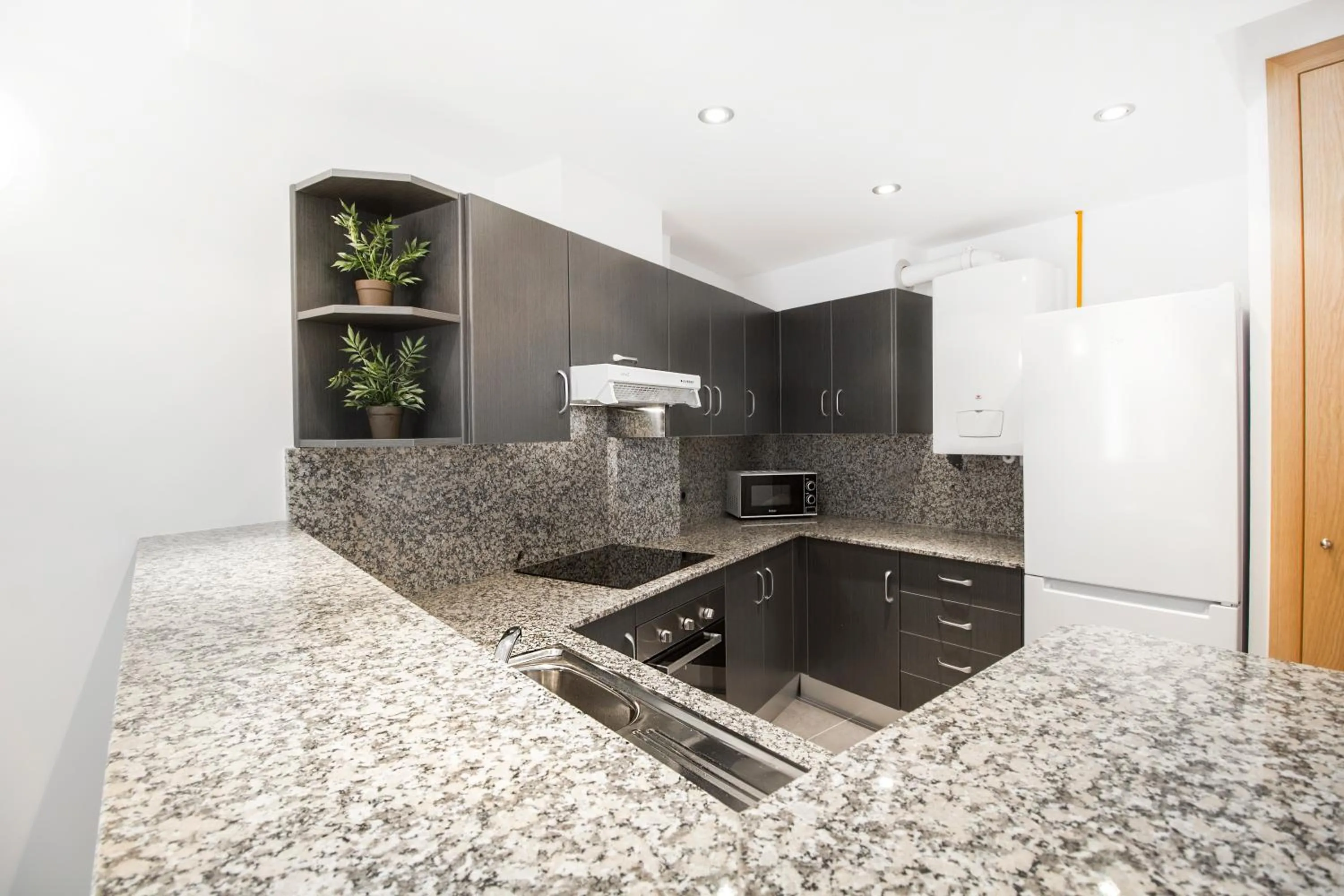 Kitchen or kitchenette in Font del Ferro Apartments