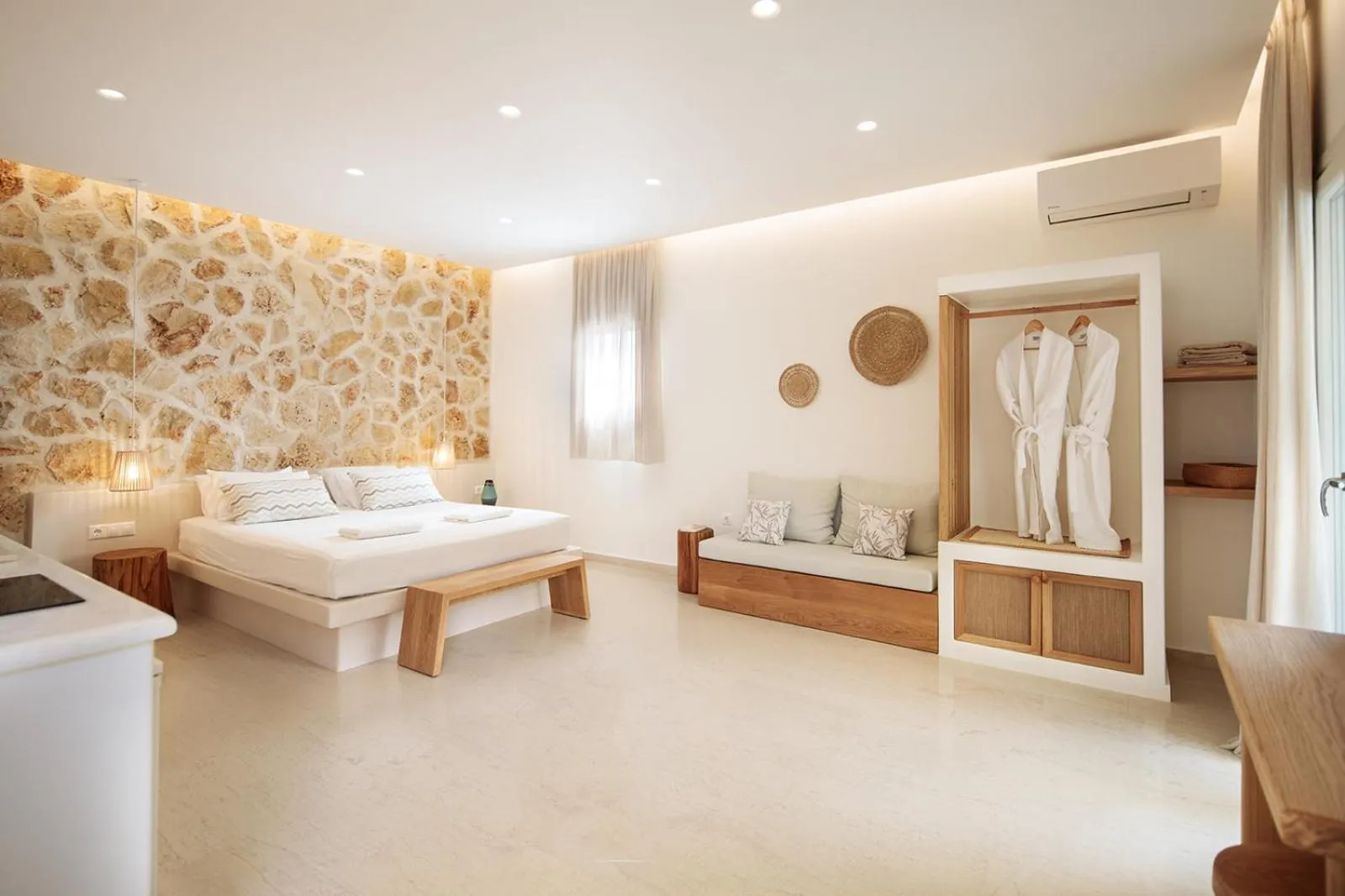 Bed in Proteas Hotel & Suites