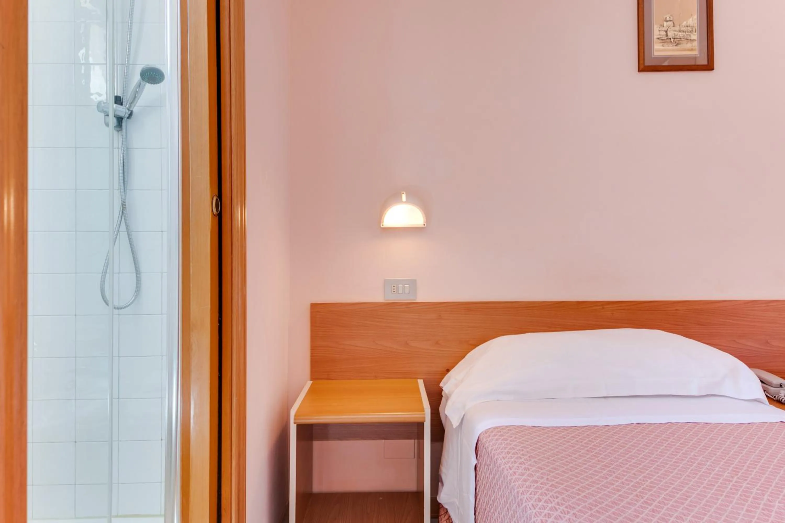 Bed in Hotel Sorriso