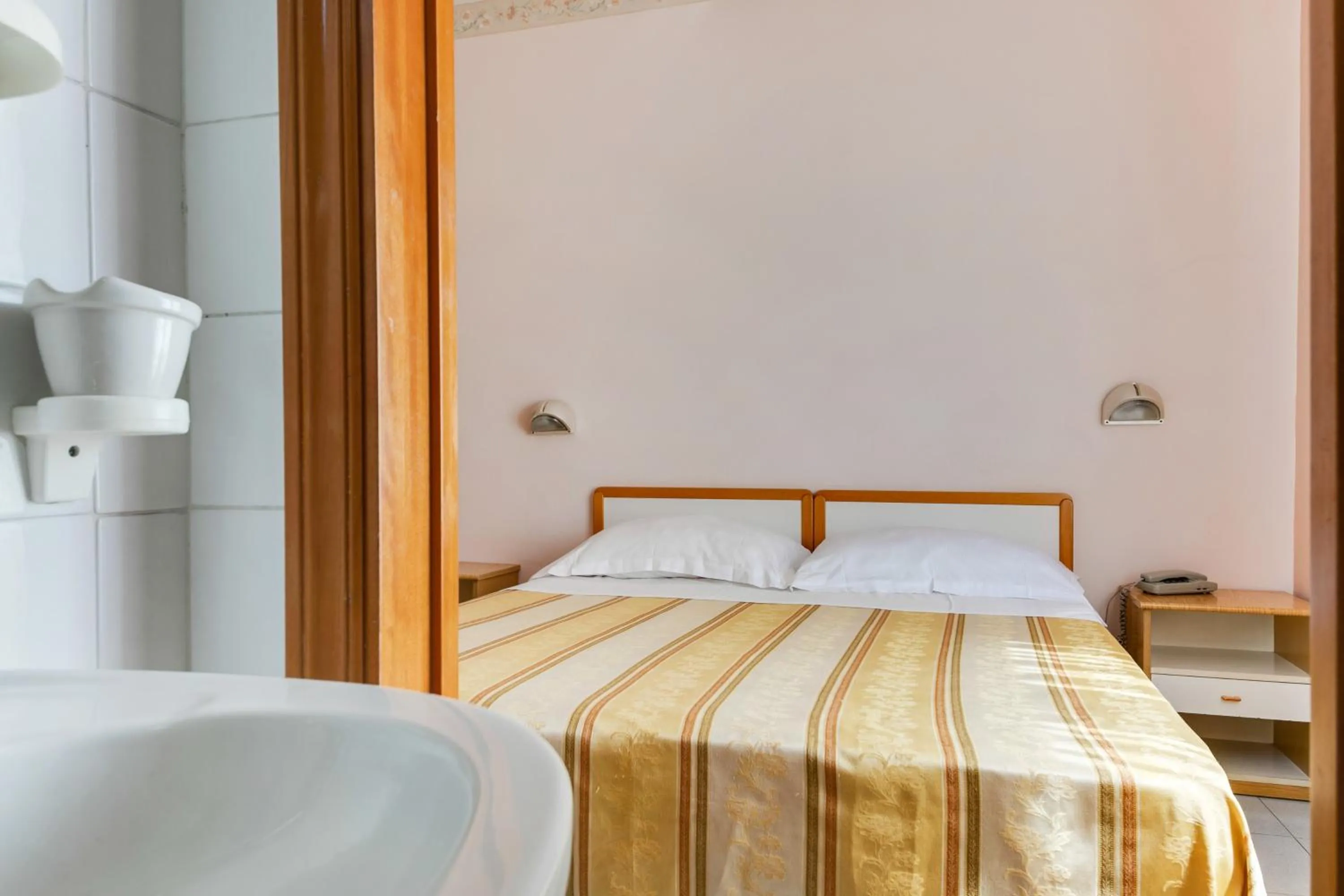 Bed in Hotel Sorriso