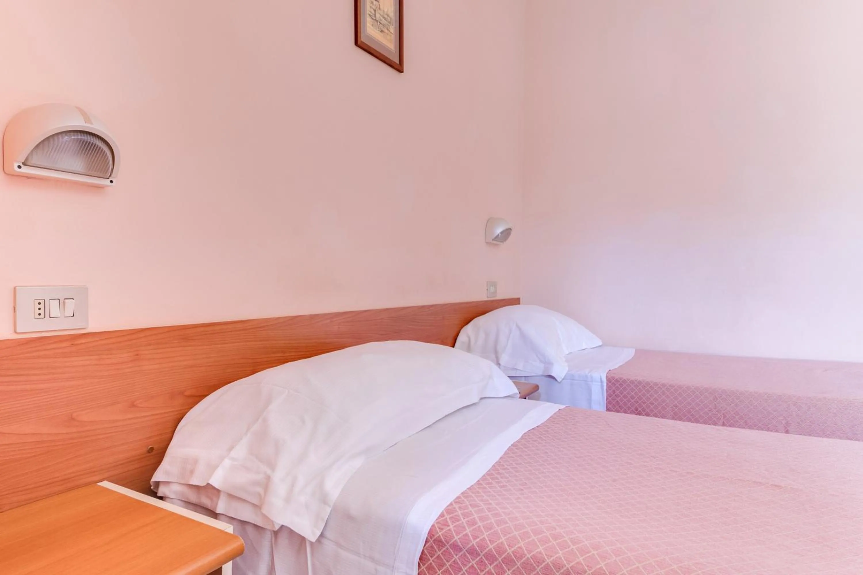 Bed in Hotel Sorriso